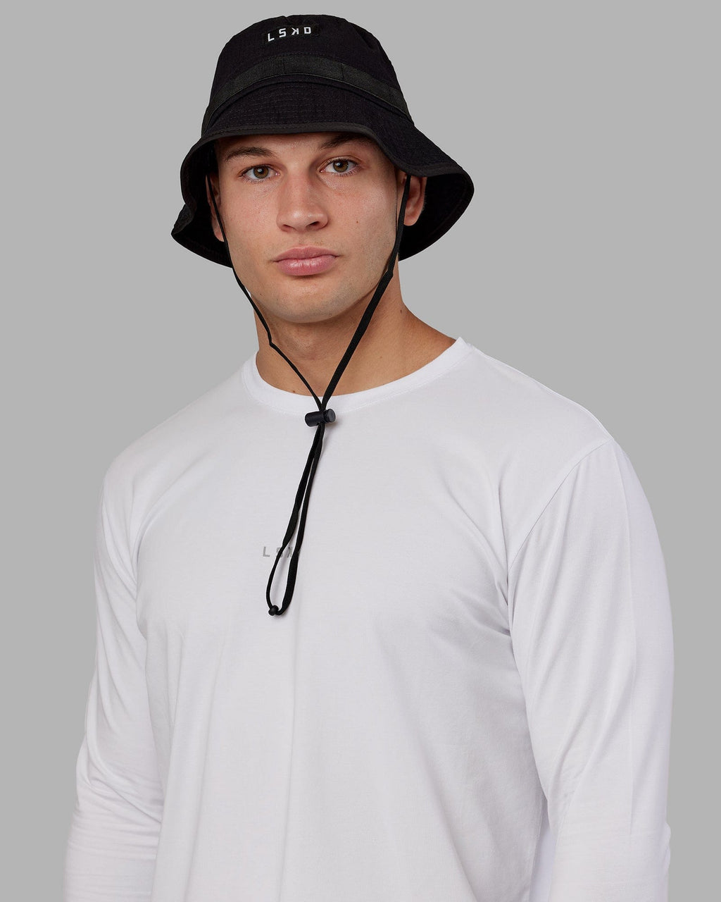 Model wearing Performance Boonie Hat - Black