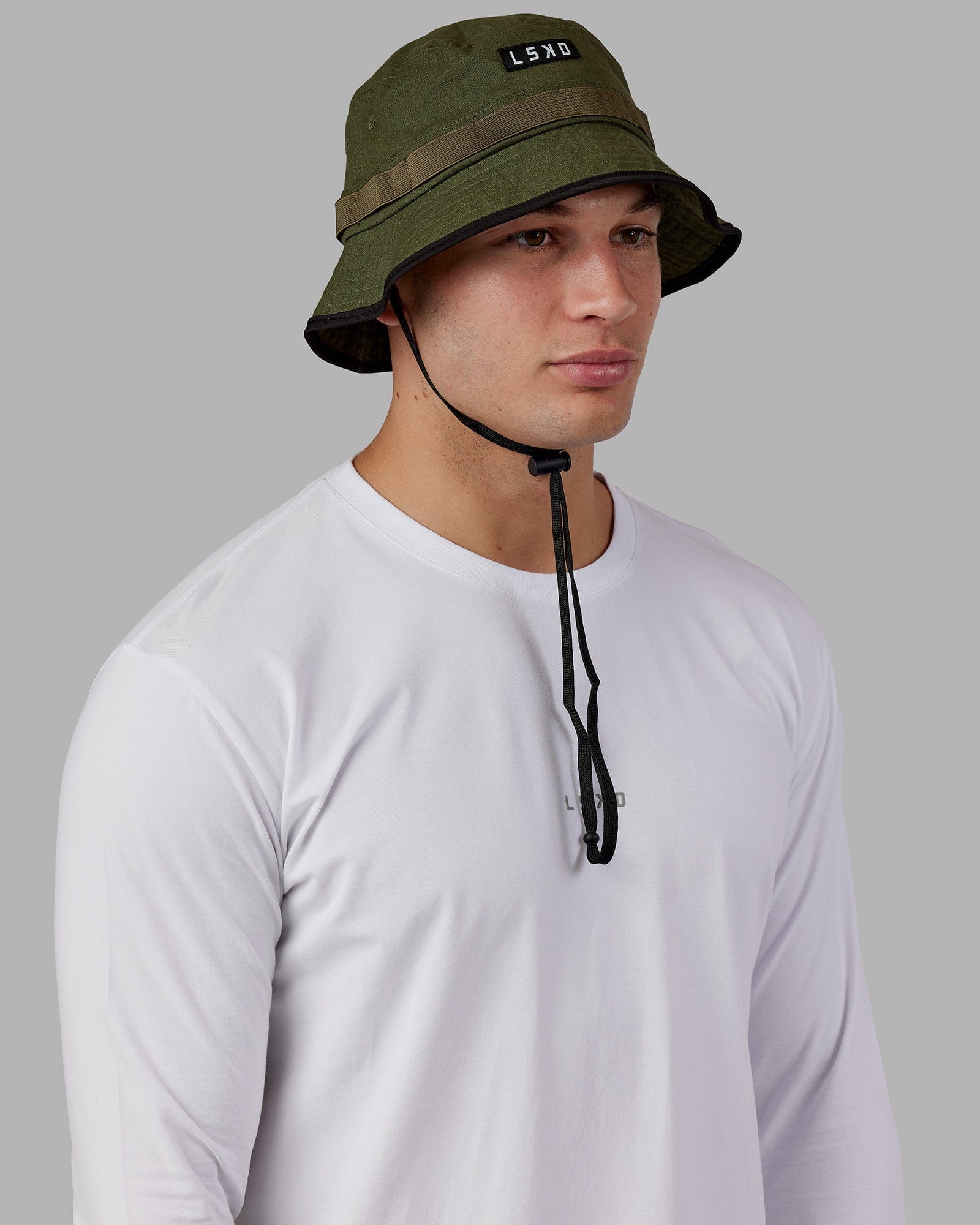 Model wearing Performance Boonie Hat - Olive