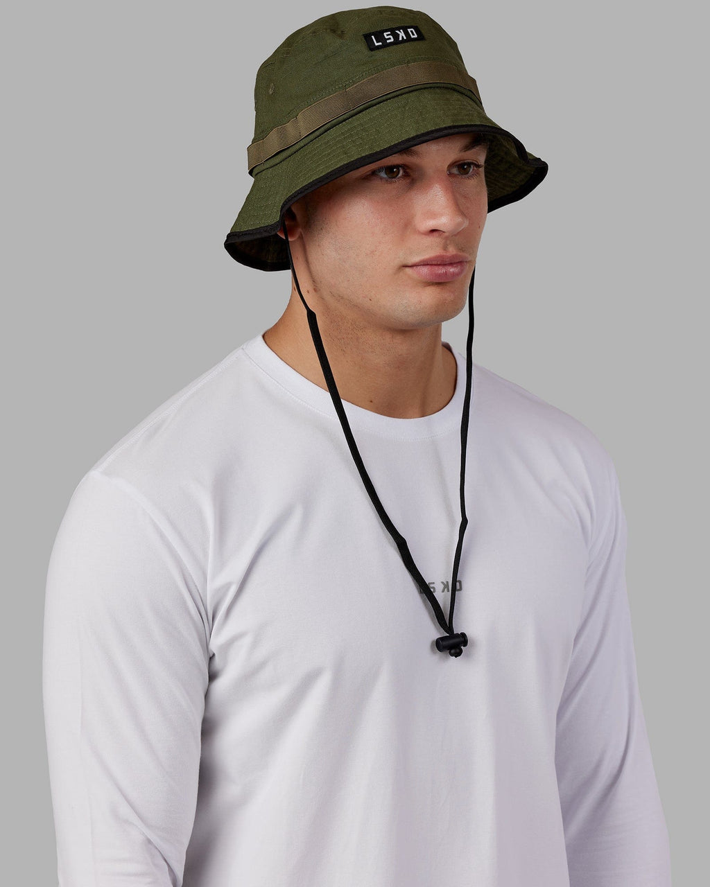 Model wearing Performance Boonie Hat - Olive