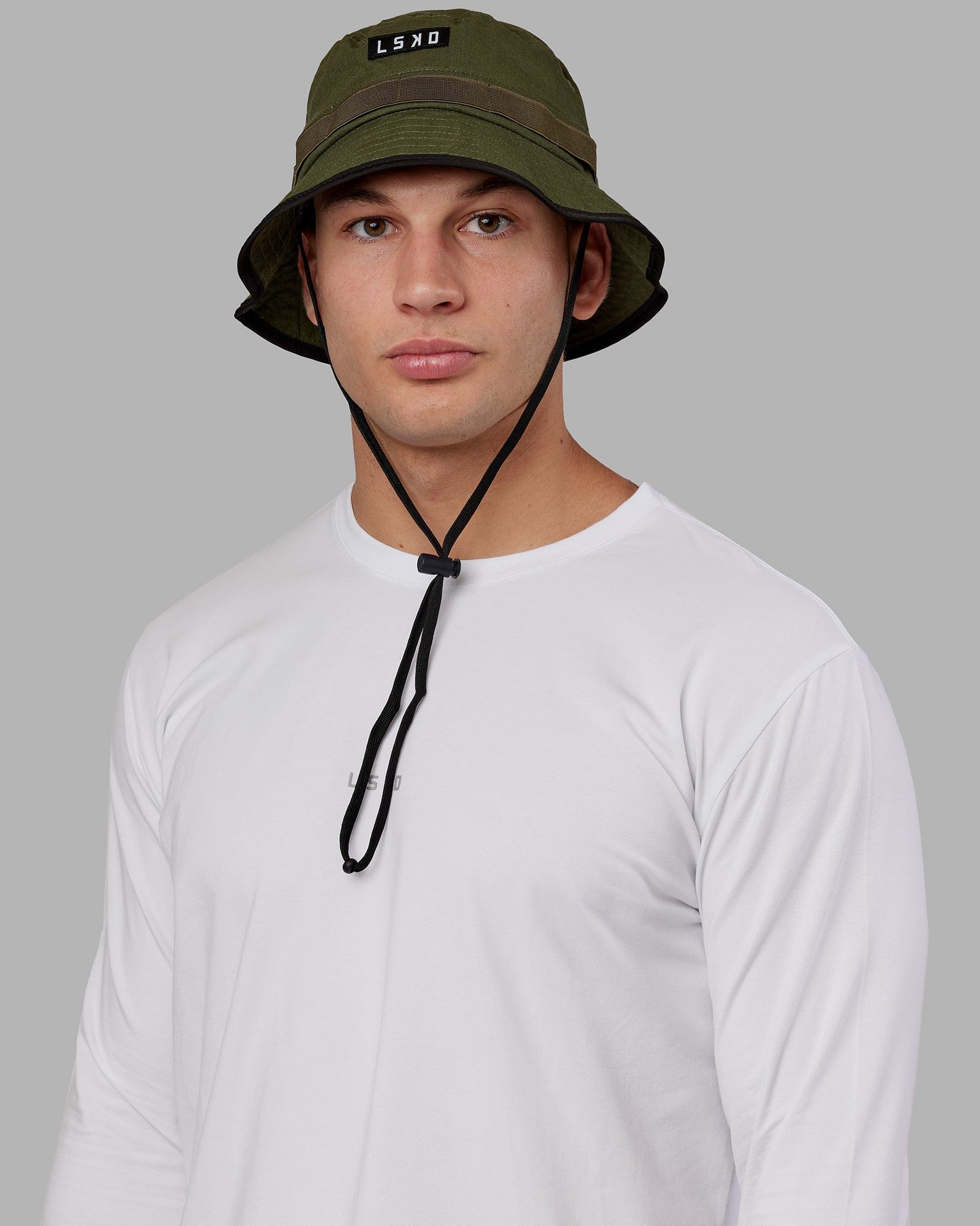 Model wearing Performance Boonie Hat - Olive