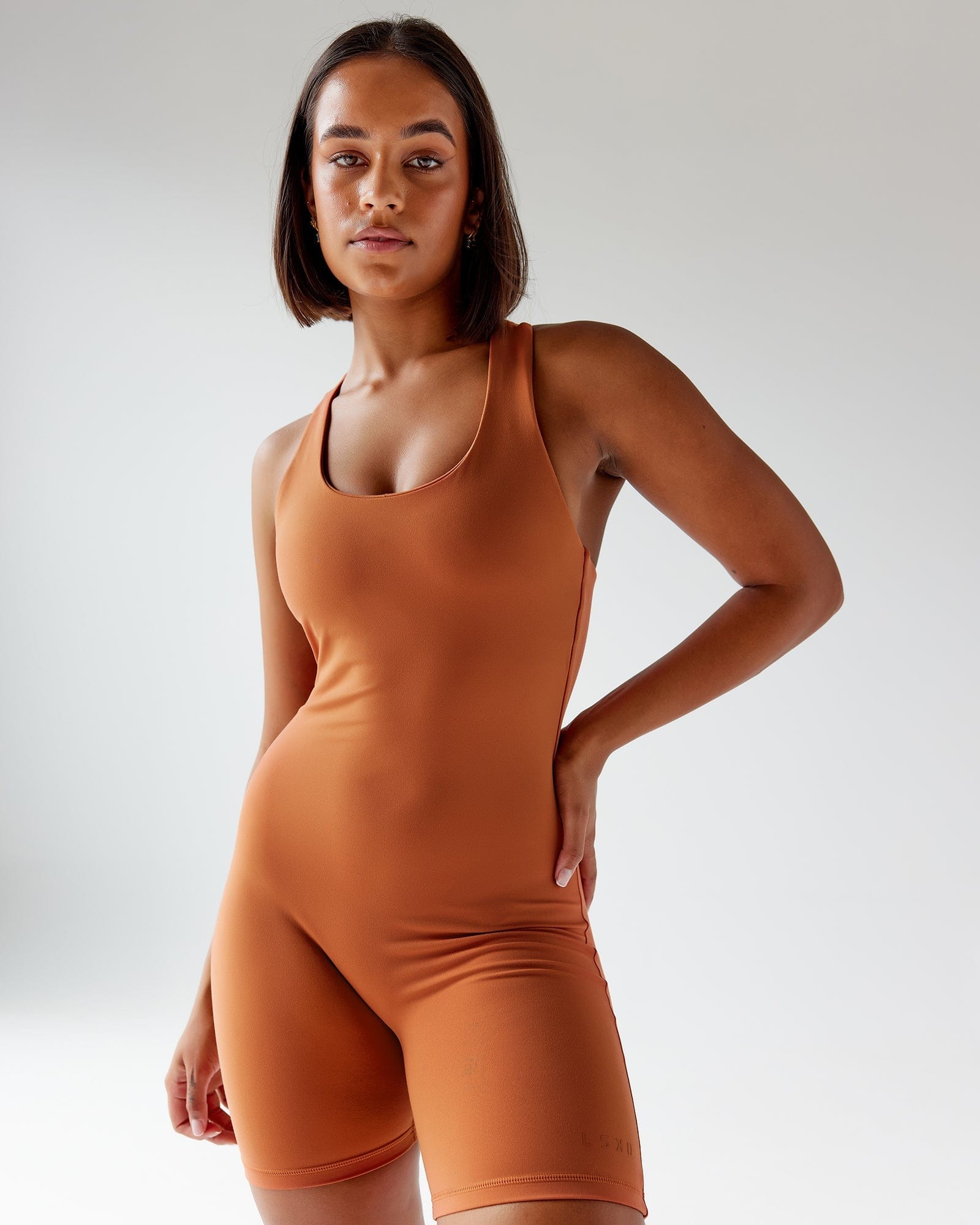 Model wearing Boost Bodysuit - Auburn