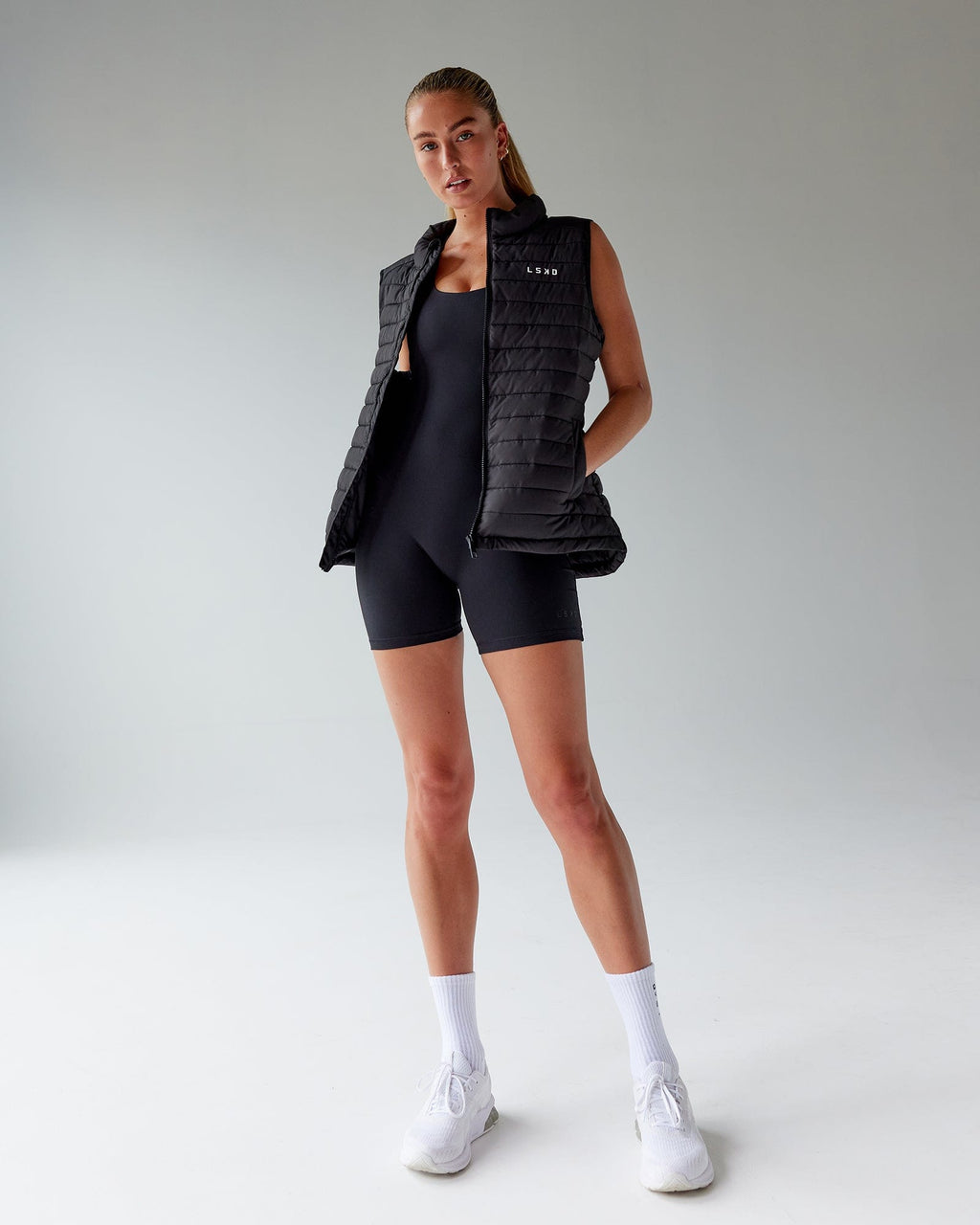 Model wearing Boost Bodysuit - Black