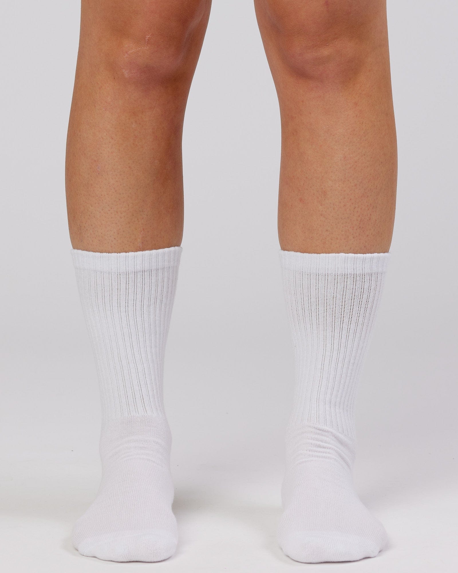 Model wearing Brand Crew Sock - White