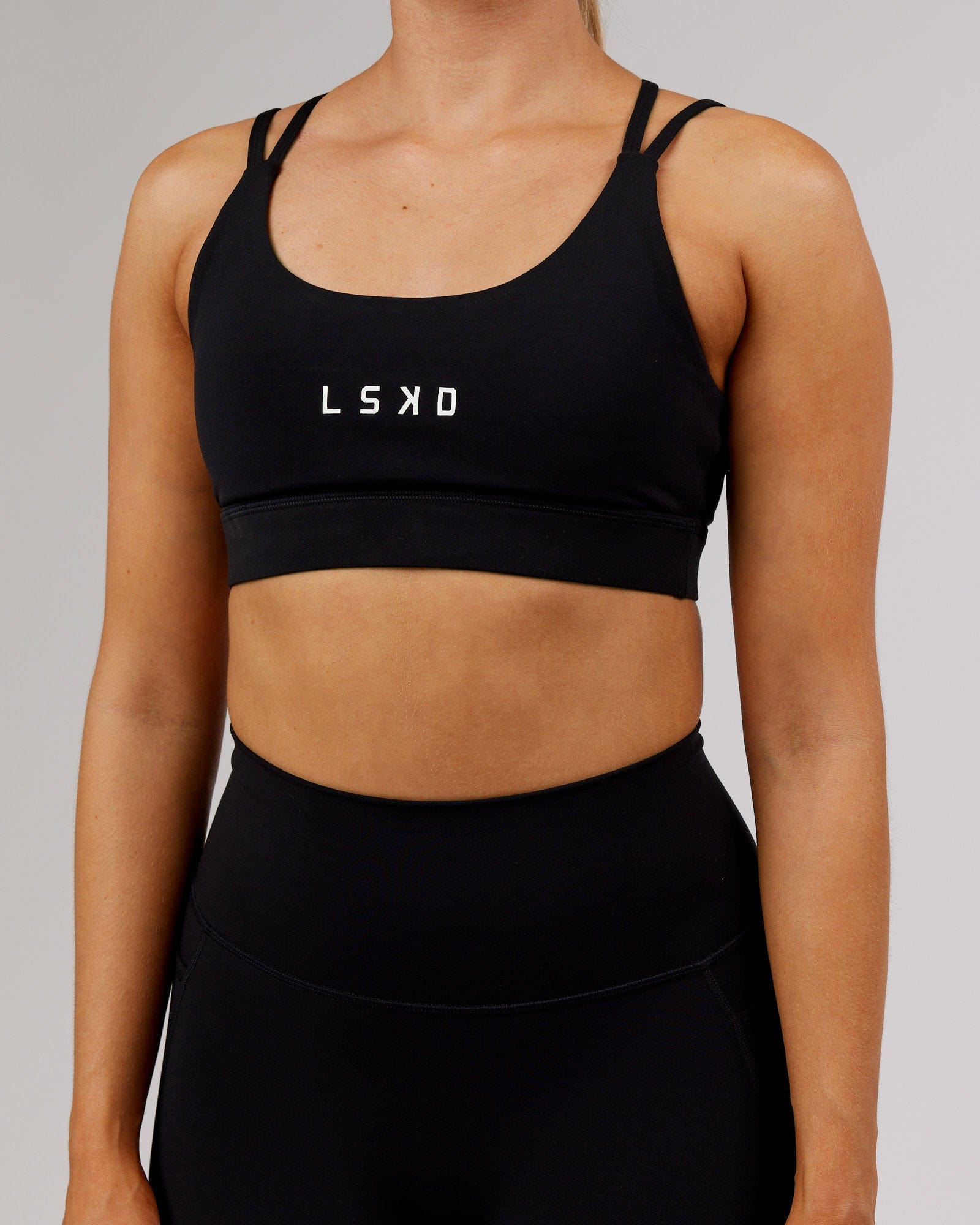 Model wearing Bridge Sports Bra - Black-White