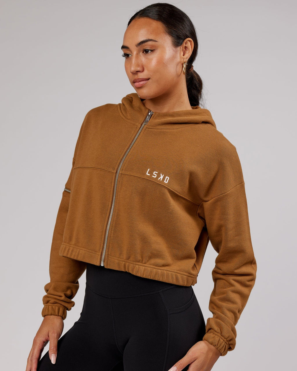 Model wearing Bridge Zip Through Hoodie - Camel