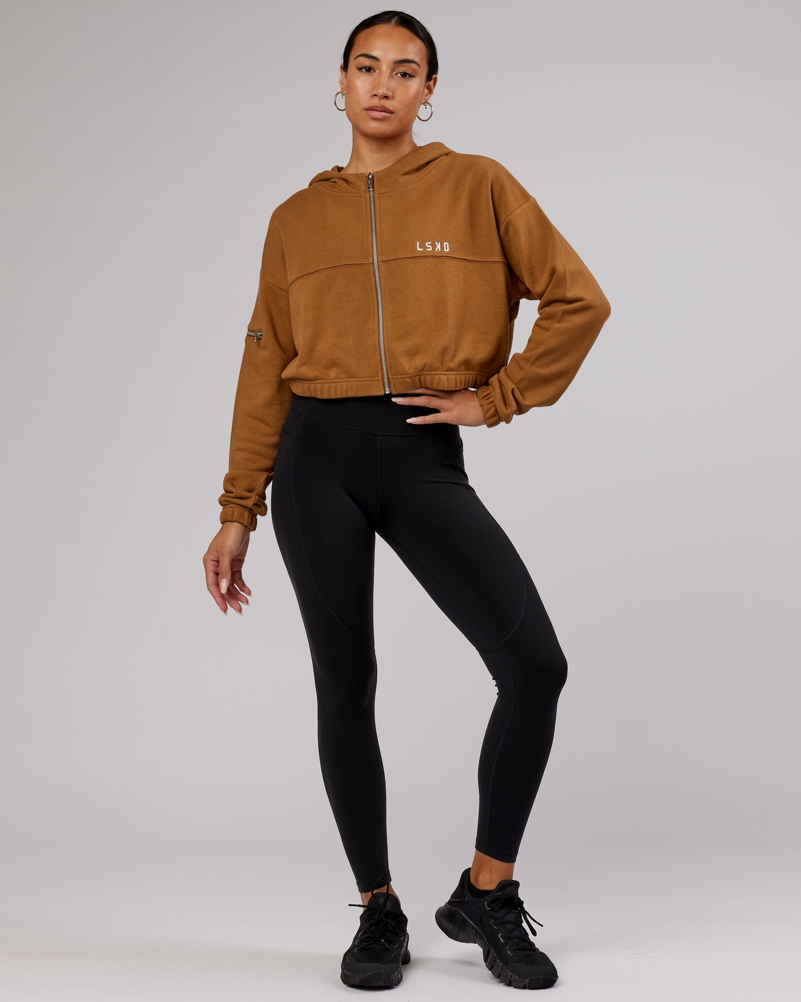 Model wearing Bridge Zip Through Hoodie - Camel