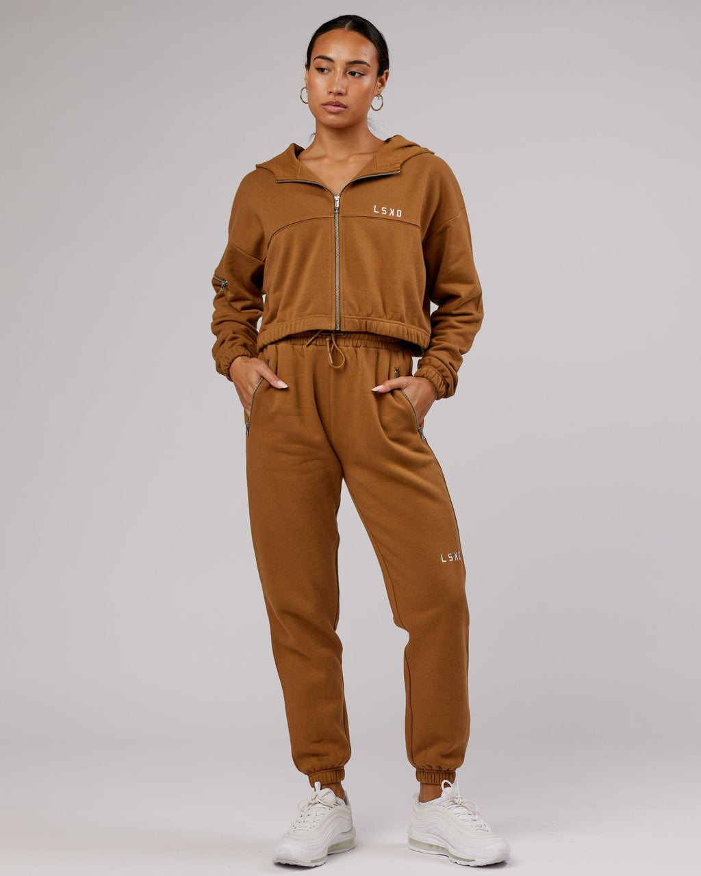 Model wearing Bridge Zip Through Hoodie - Camel