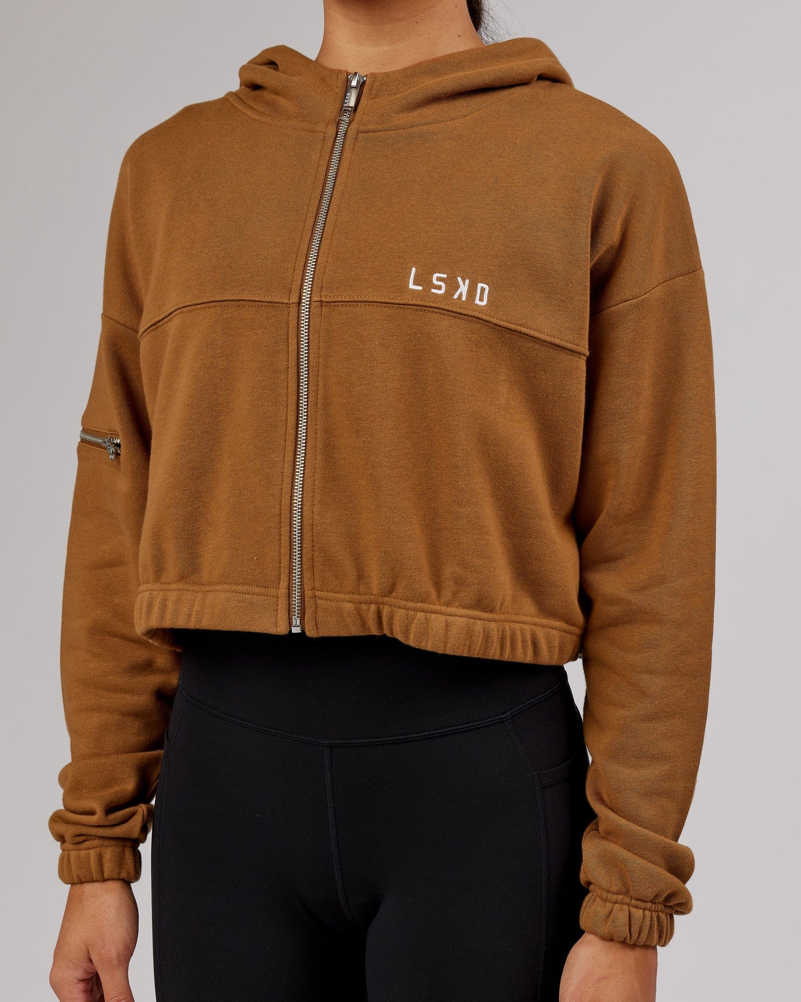 Model wearing Bridge Zip Through Hoodie - Camel