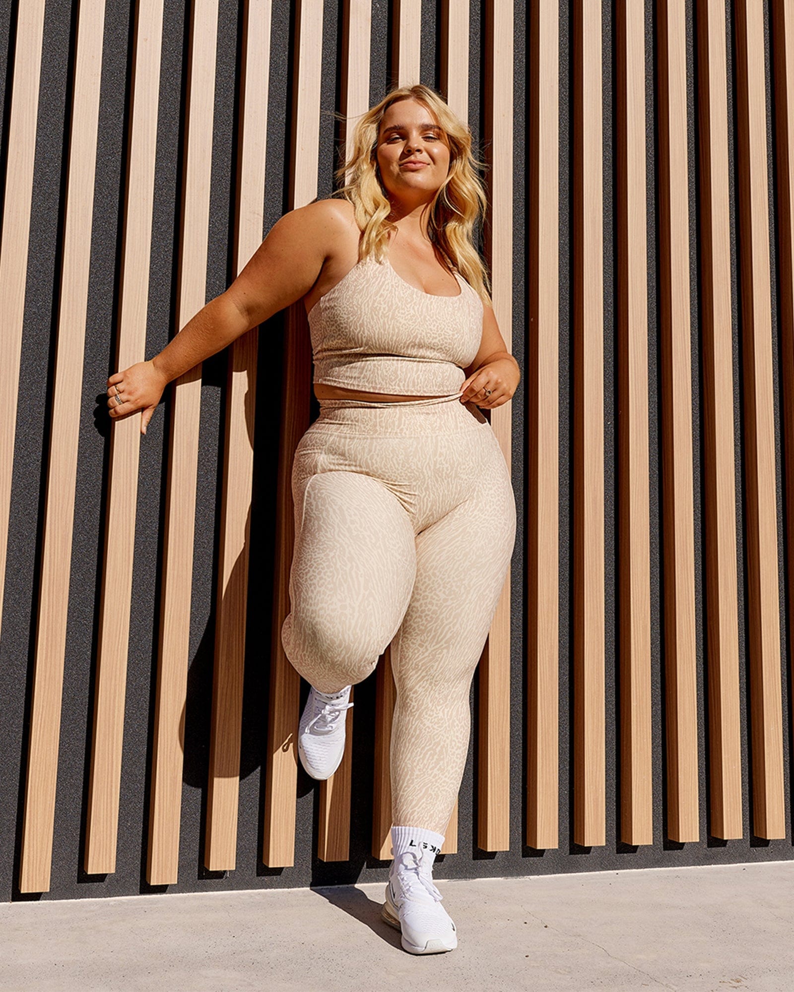 Model wearing Determined Shelf Sports Tank - Rise Print