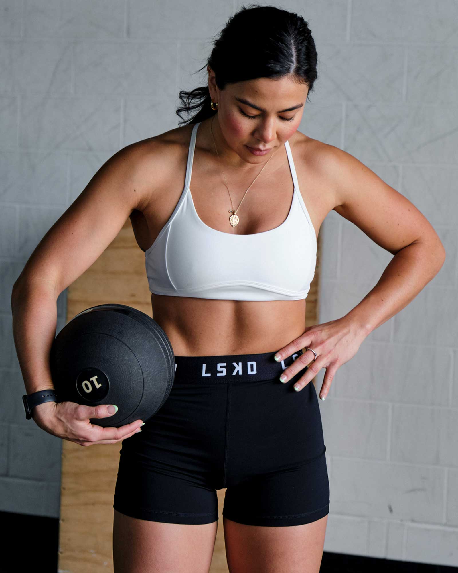 Model wearing Contour Sports Bra - White