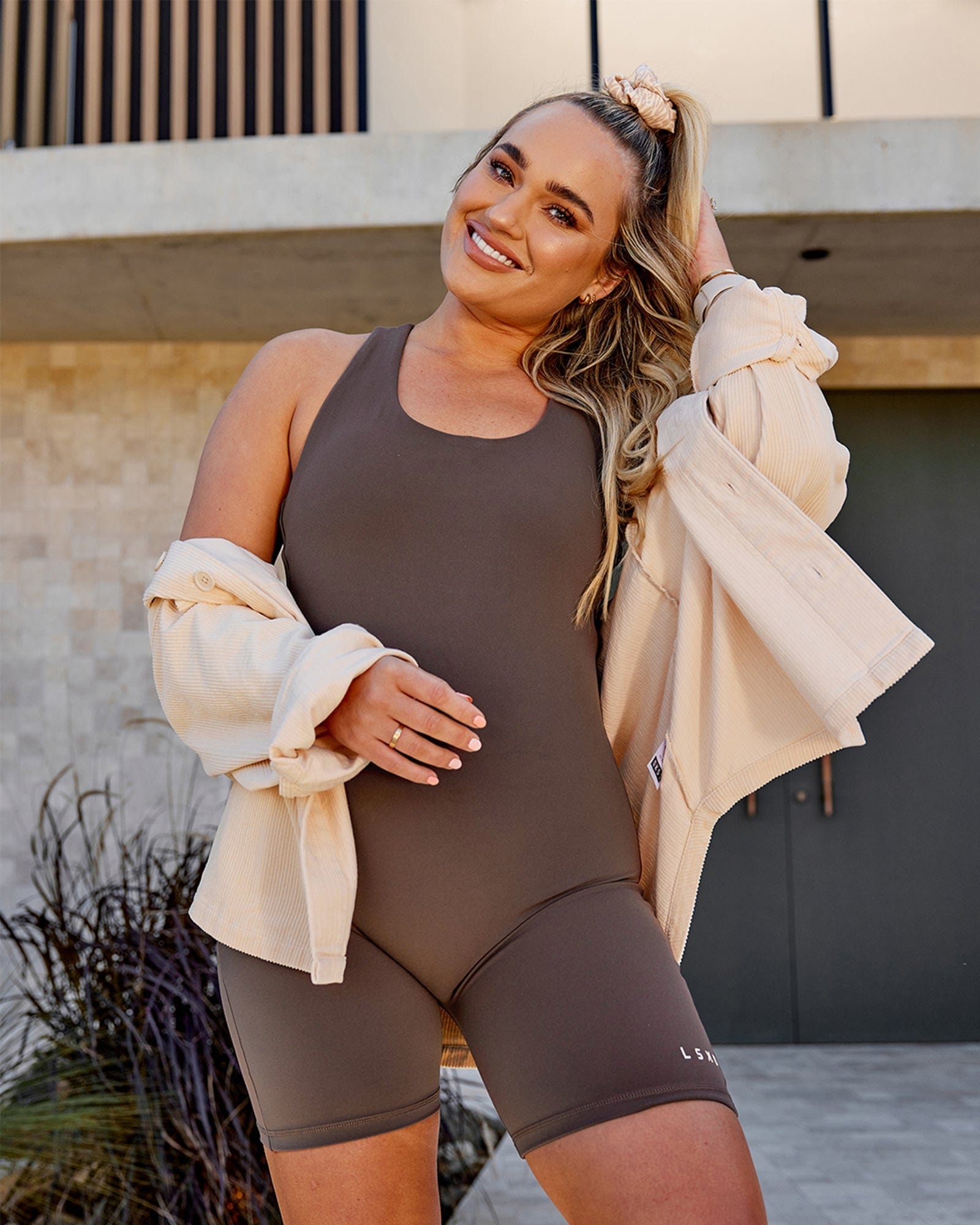 Model wearing Boost Bodysuit - Mocha