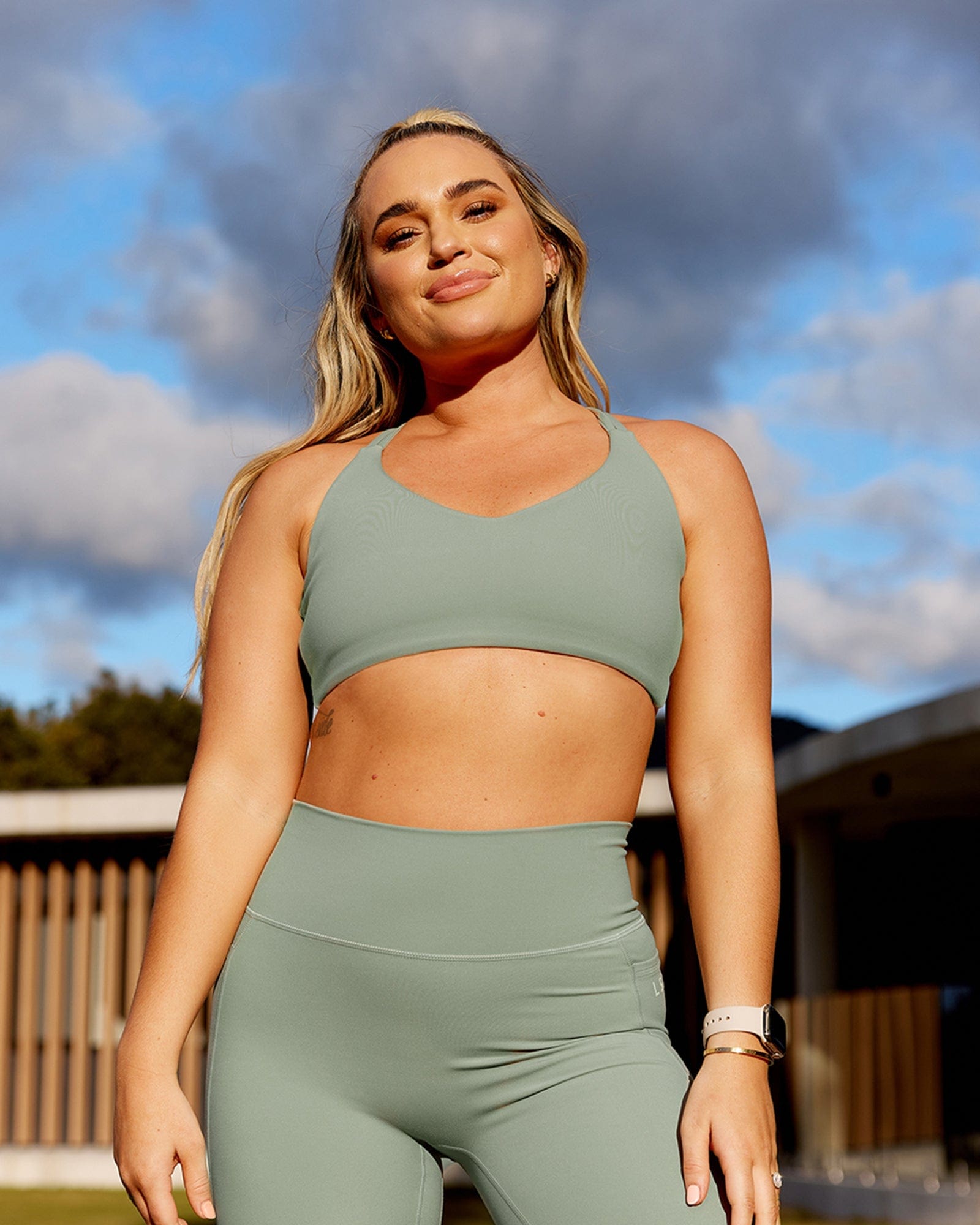 Model wearing Uplift Recycled Sports Bra - Sage