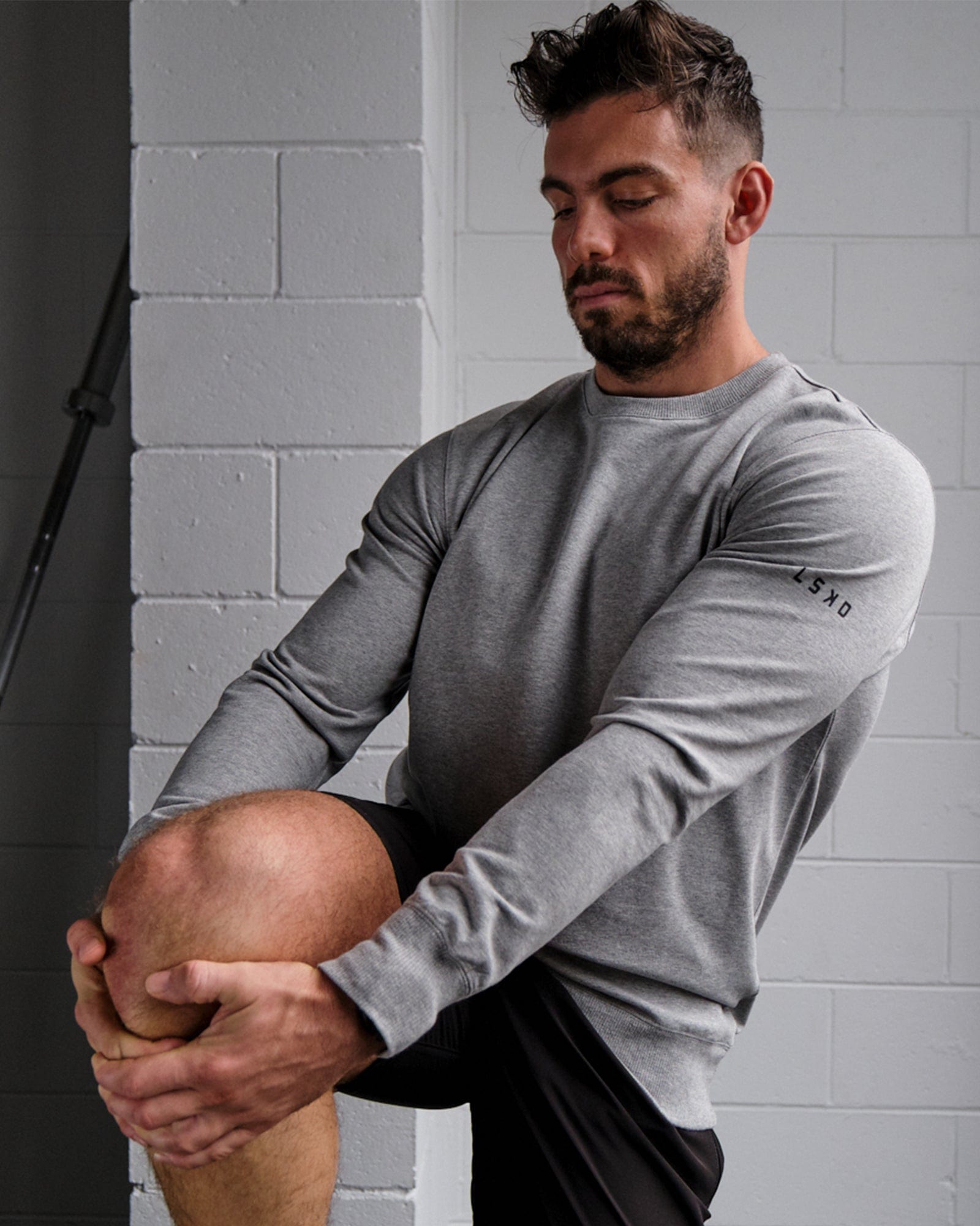 Model wearing Rival FLXFleece Training Fit Sweater - Lt Grey Marl