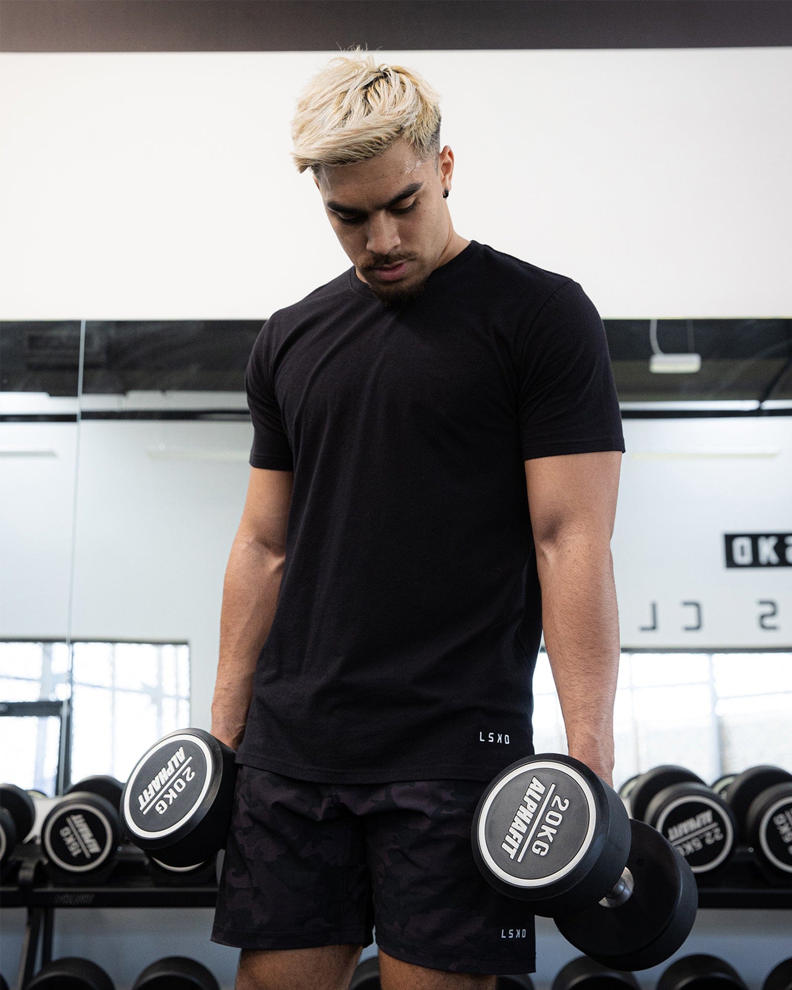 Model wearing Intensity FLXDRY Performance Tee - Black
