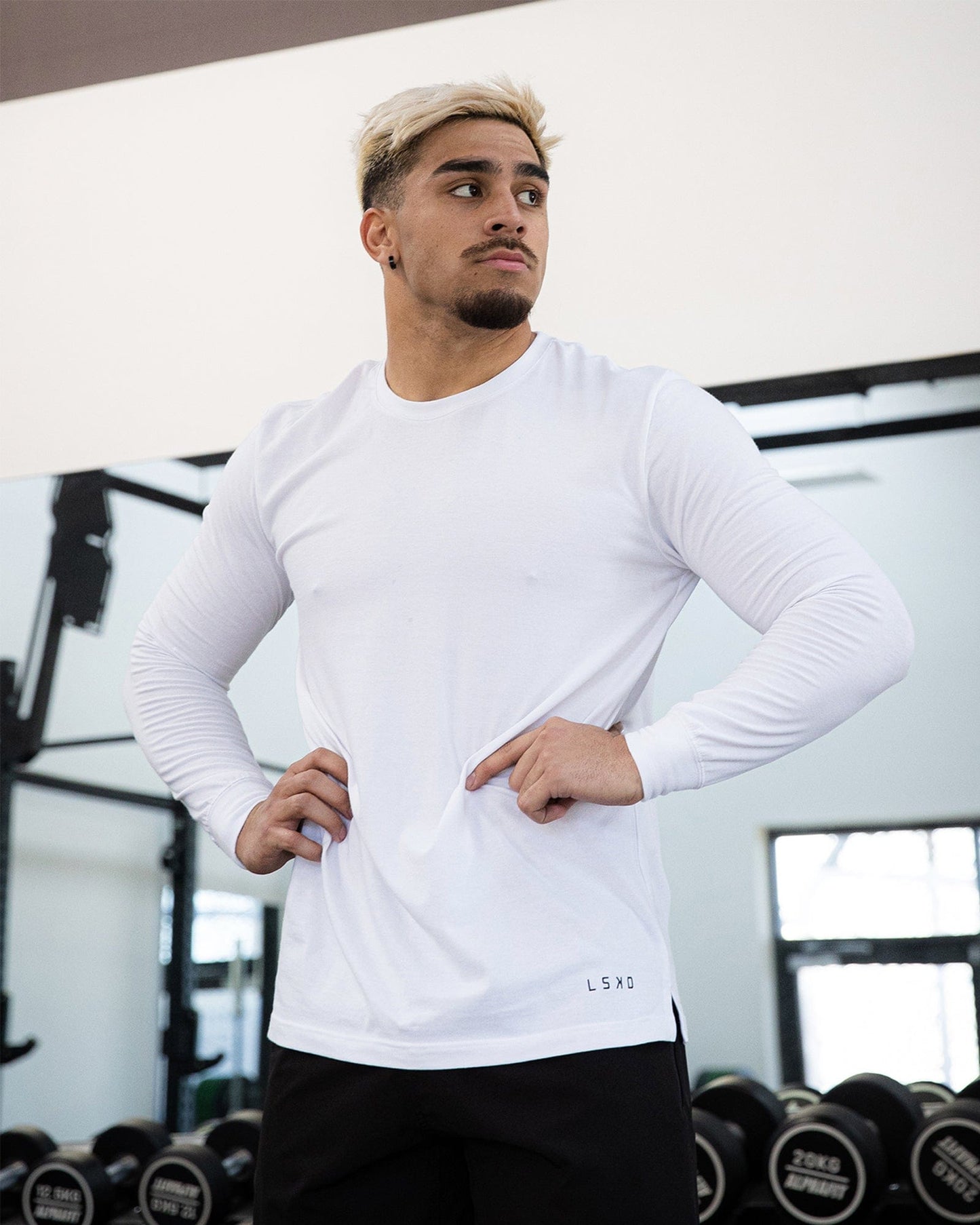 Model wearing Intensity FLXDRY Performance LS Tee - White