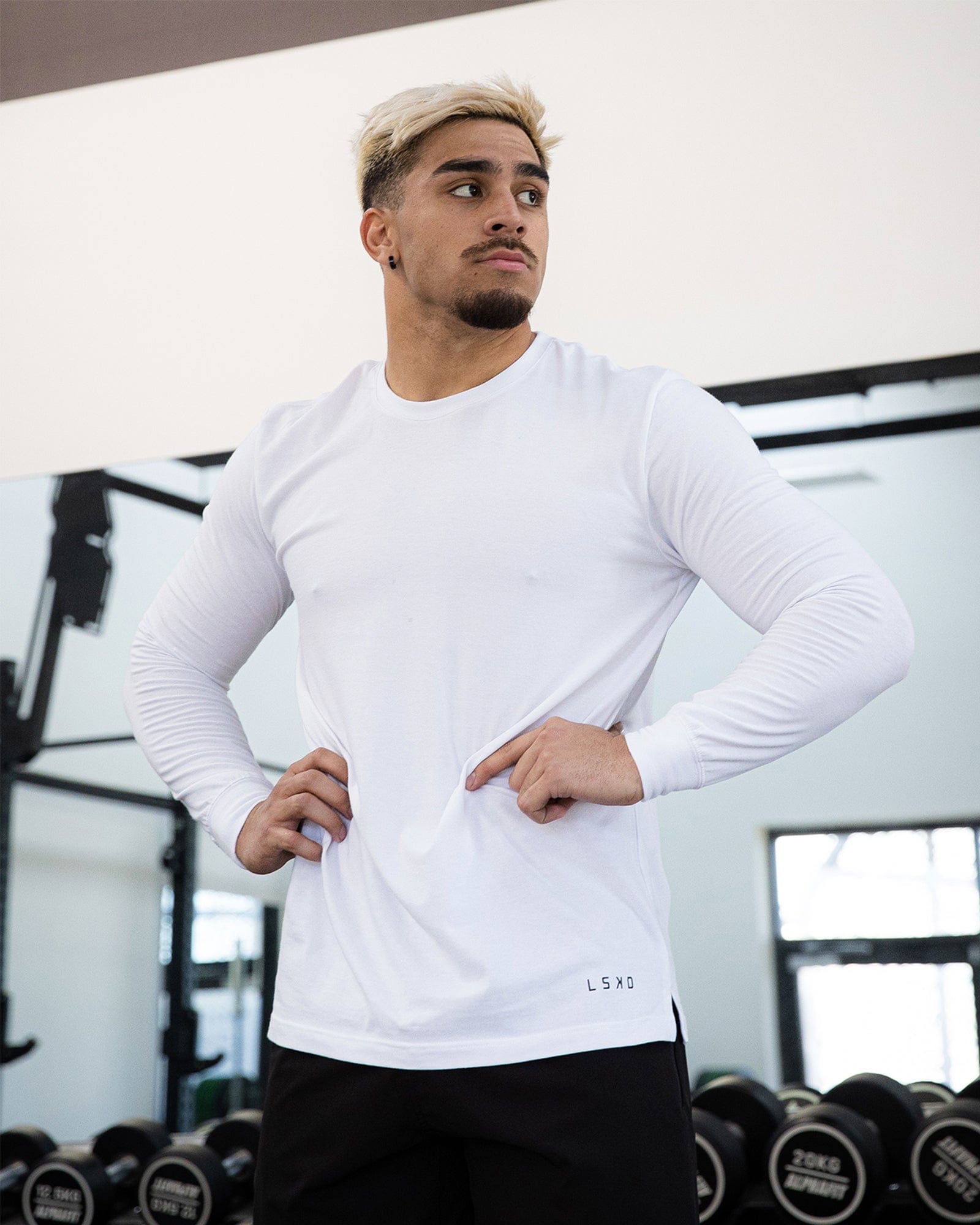 Model wearing Intensity FLXDRY Performance LS Tee - White