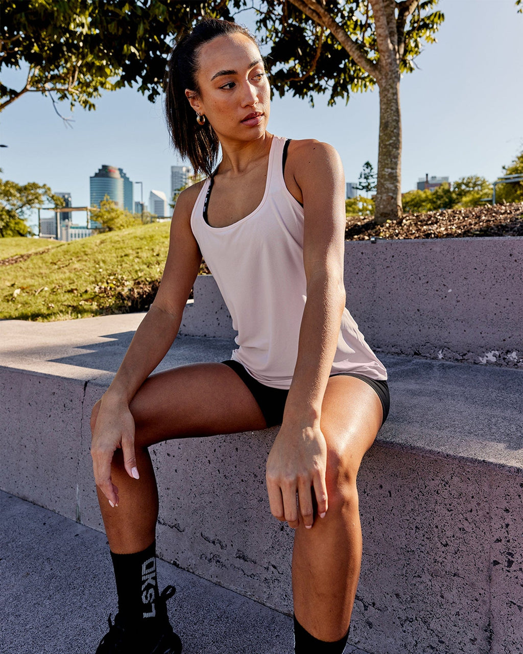 Model wearing Freedom Performance Tank - Pink