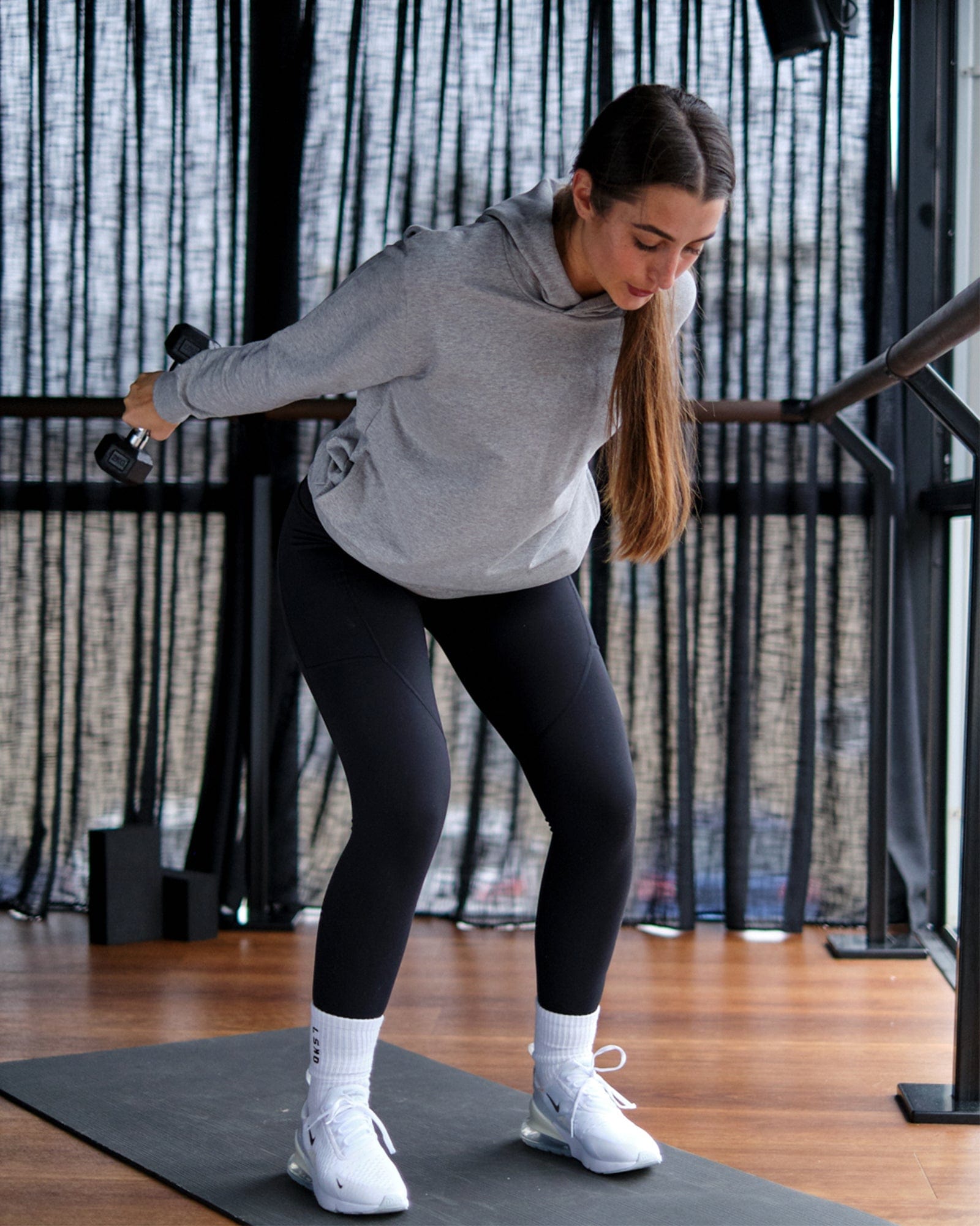 Model wearing Unisex Rival FLXFleece Training Fit Hoodie - Lt Grey Marl