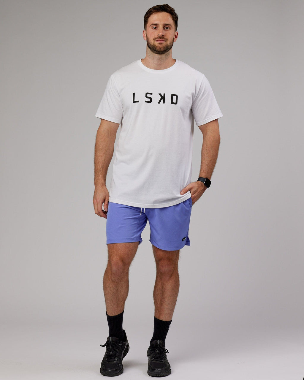 Model wearing Capsule 7" Performance Short - Cornflower Blue