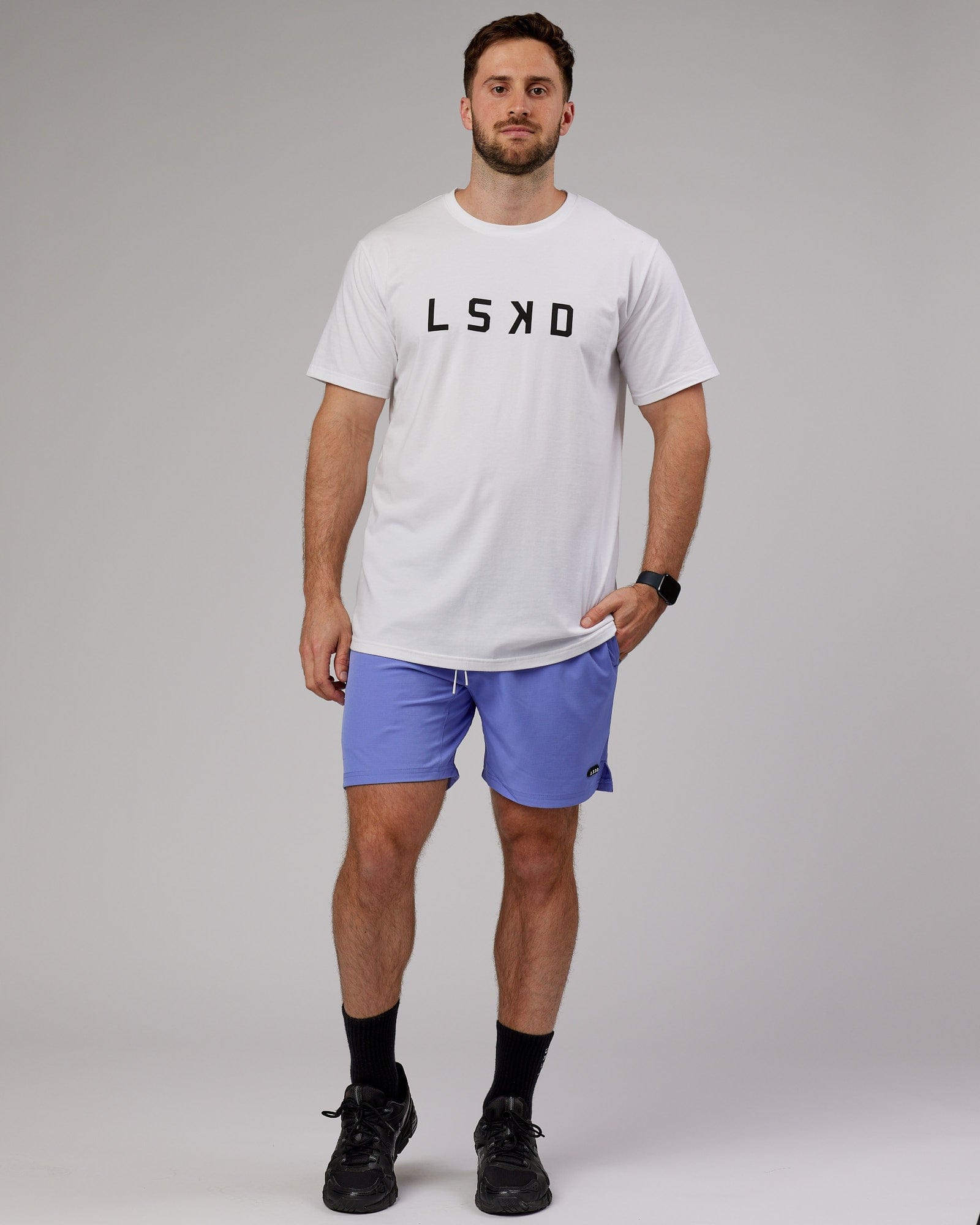 Model wearing Capsule 7" Performance Short - Cornflower Blue