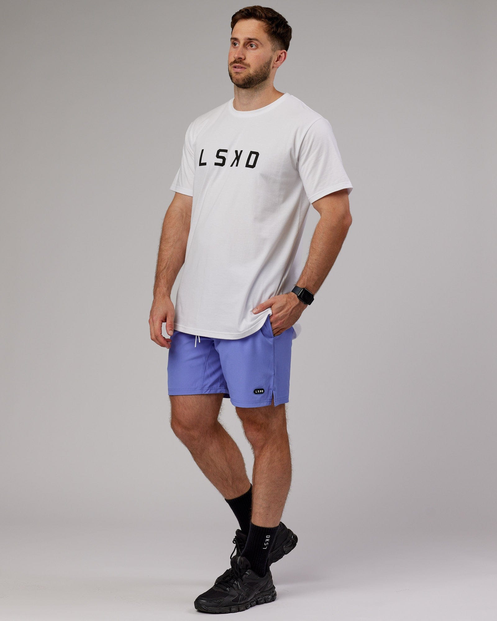 Model wearing Capsule 7" Performance Short - Cornflower Blue