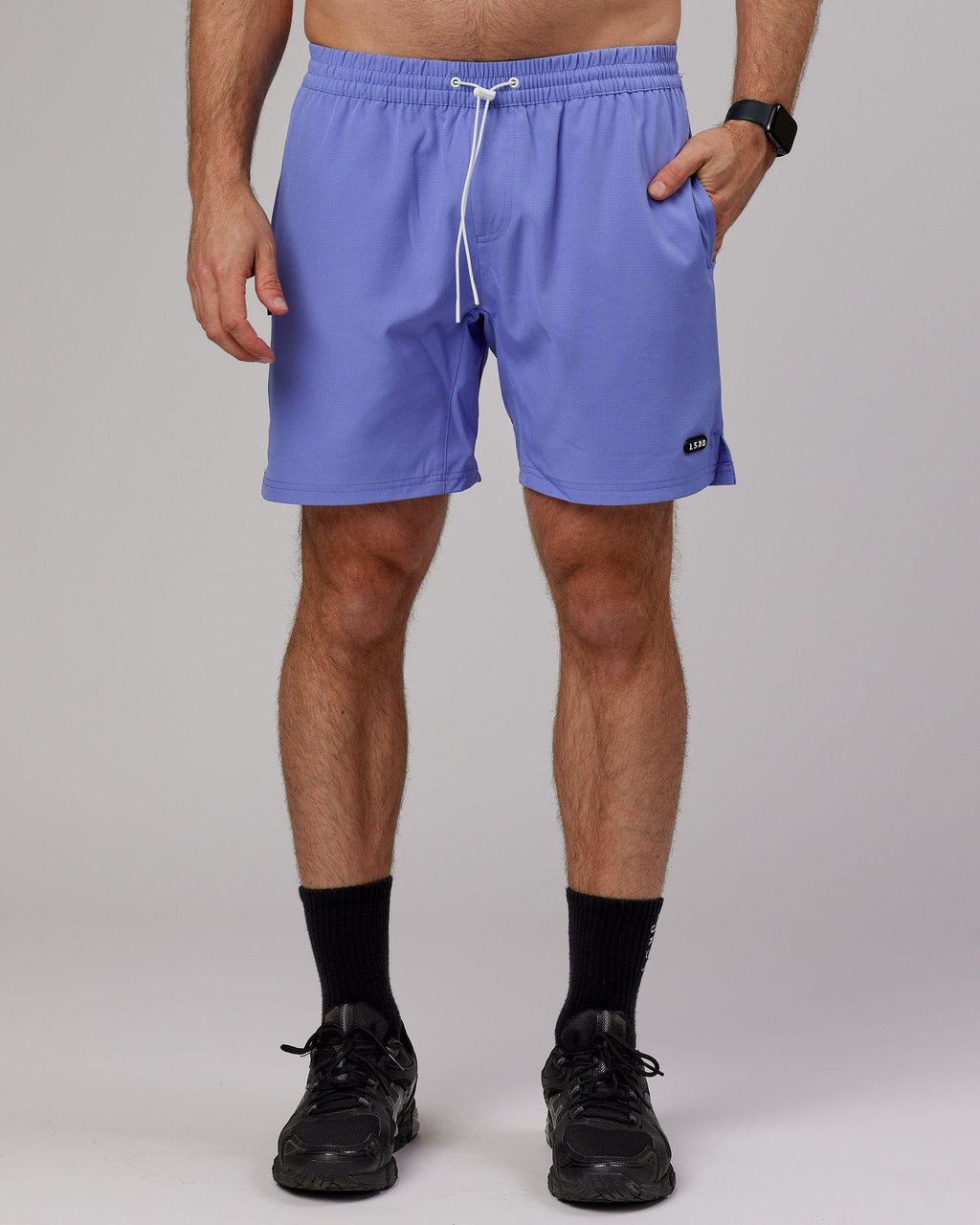 Model wearing Capsule 7" Performance Short - Cornflower Blue