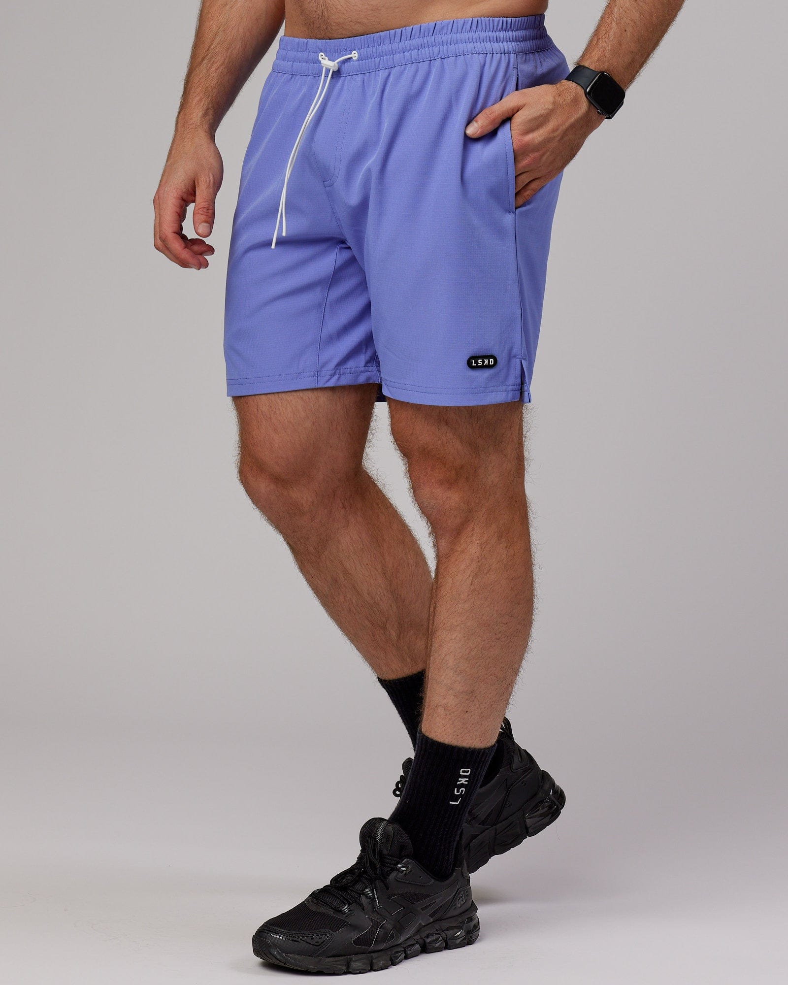 Model wearing Capsule 7" Performance Short - Cornflower Blue