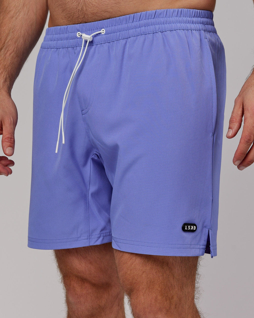 Model wearing Capsule 7" Performance Short - Cornflower Blue