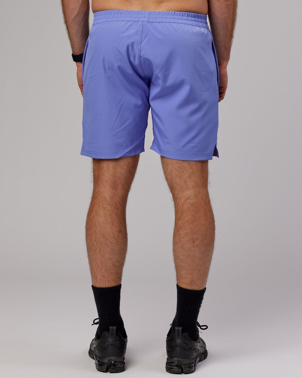 Model wearing Capsule 7" Performance Short - Cornflower Blue