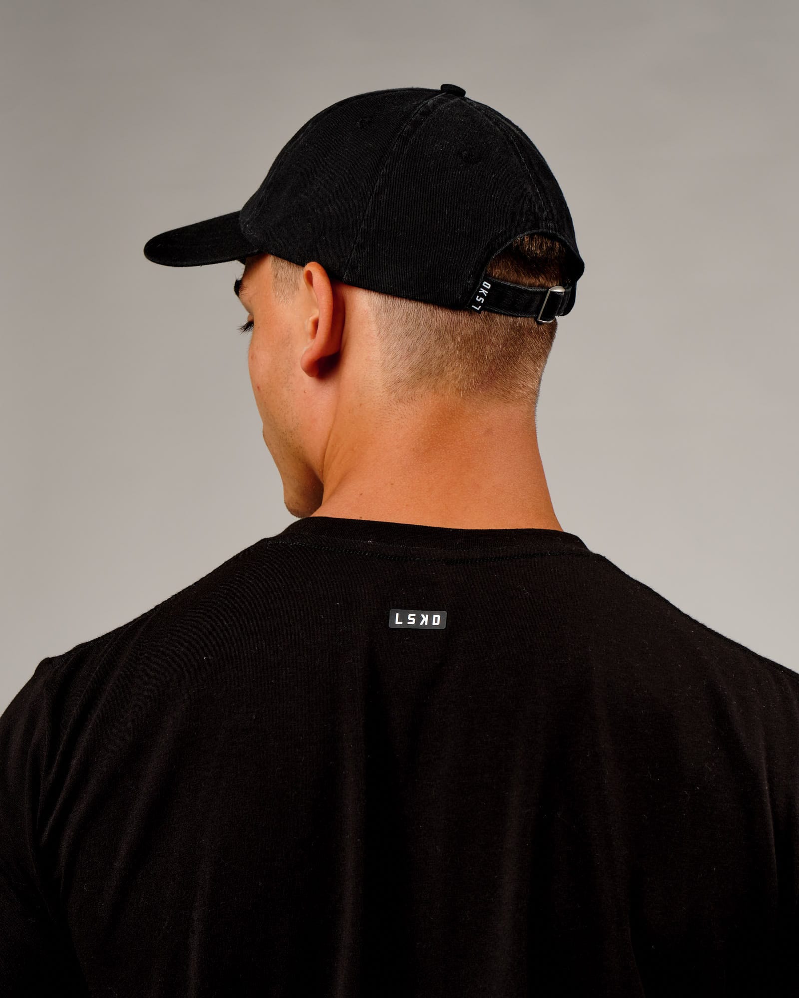 Model wearing Capsule Cap - Black