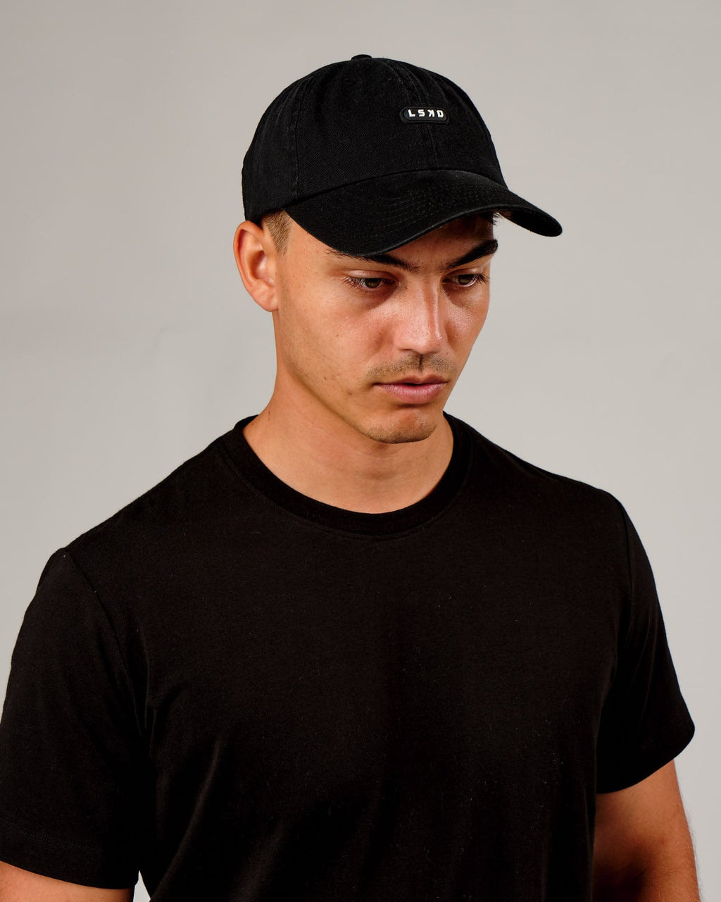 Model wearing Capsule Cap - Black