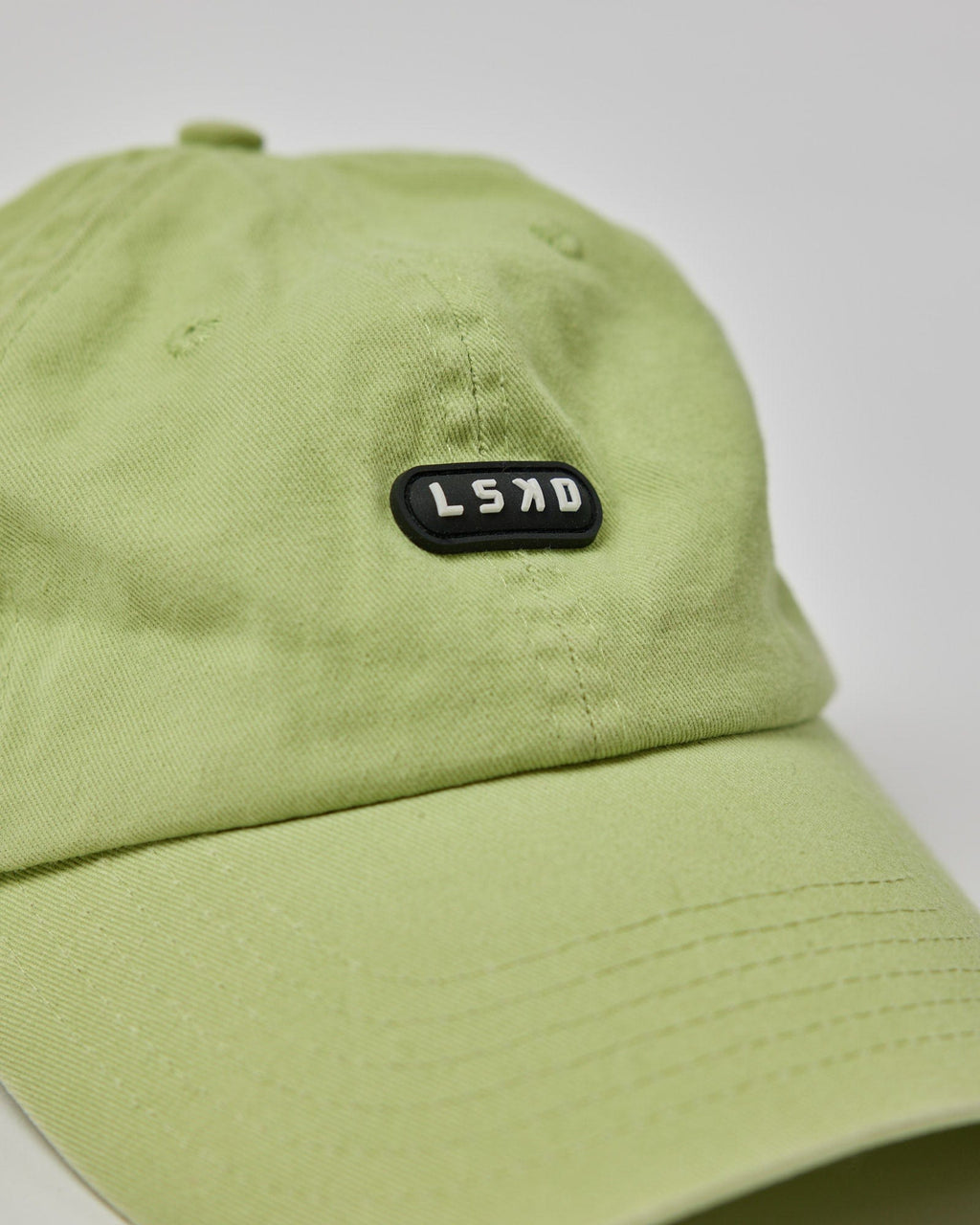 Model wearing Capsule Cap - Pastel Lime