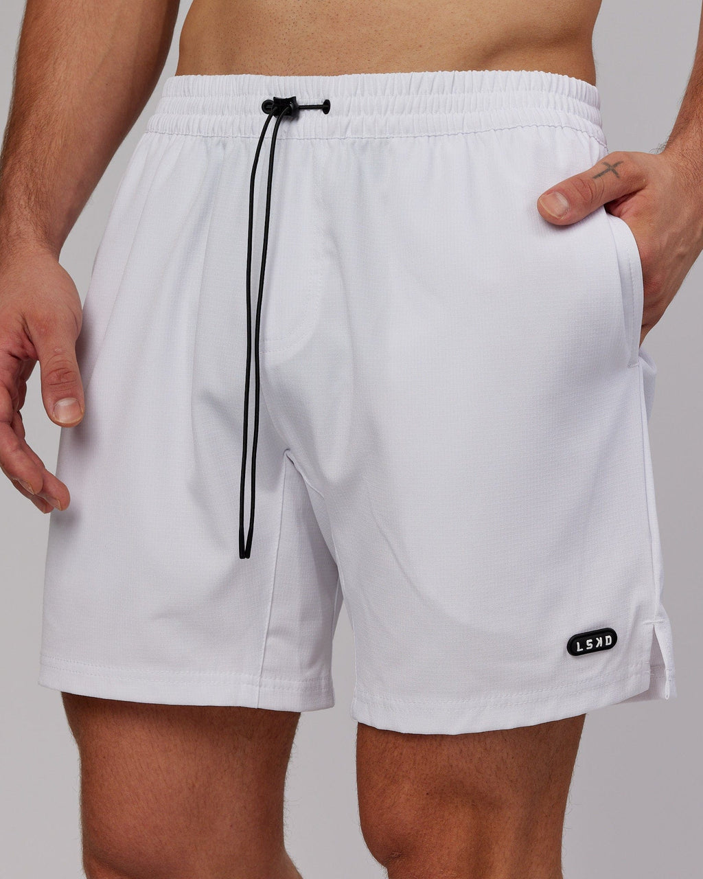 Model wearing Capsule 7" Performance Short - White