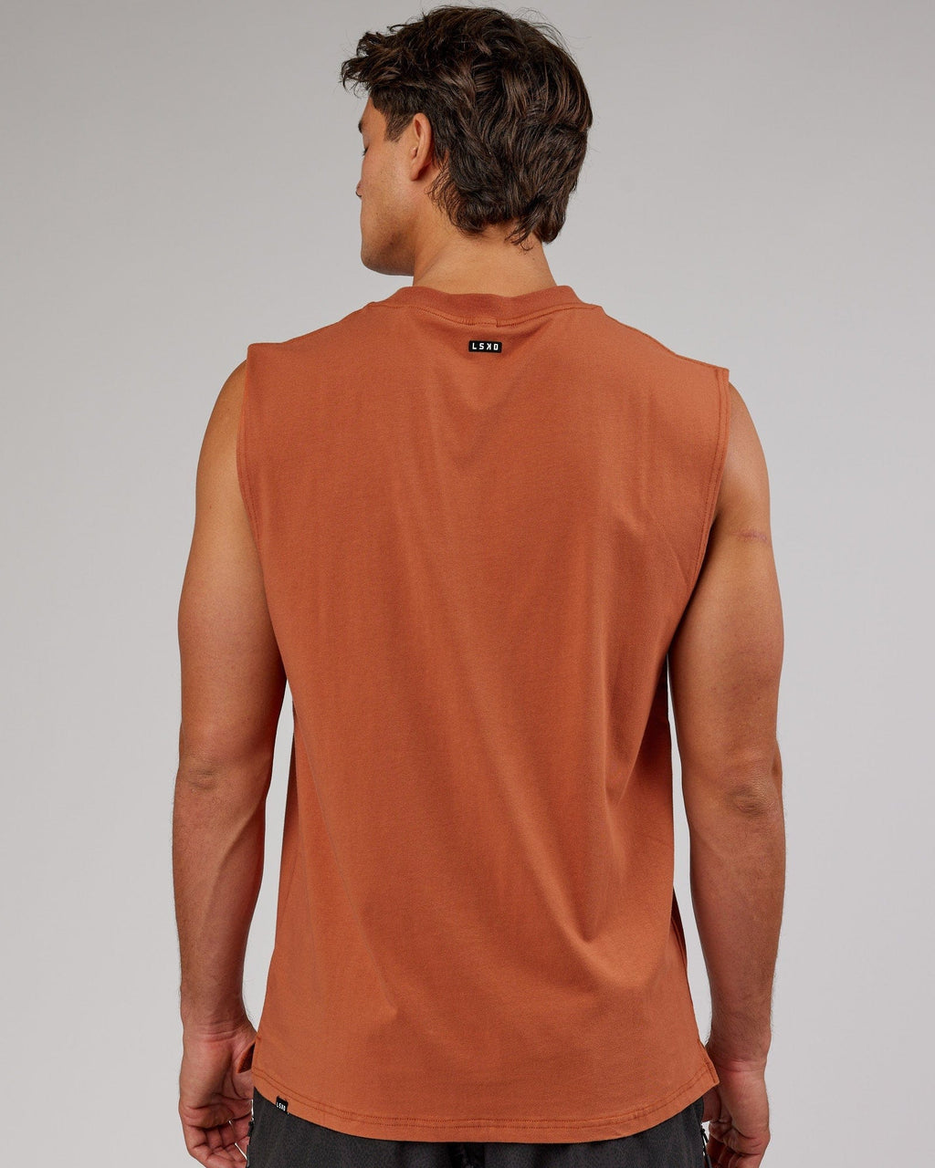 Model wearing Capsule FLXCotton Tank Oversize - Auburn