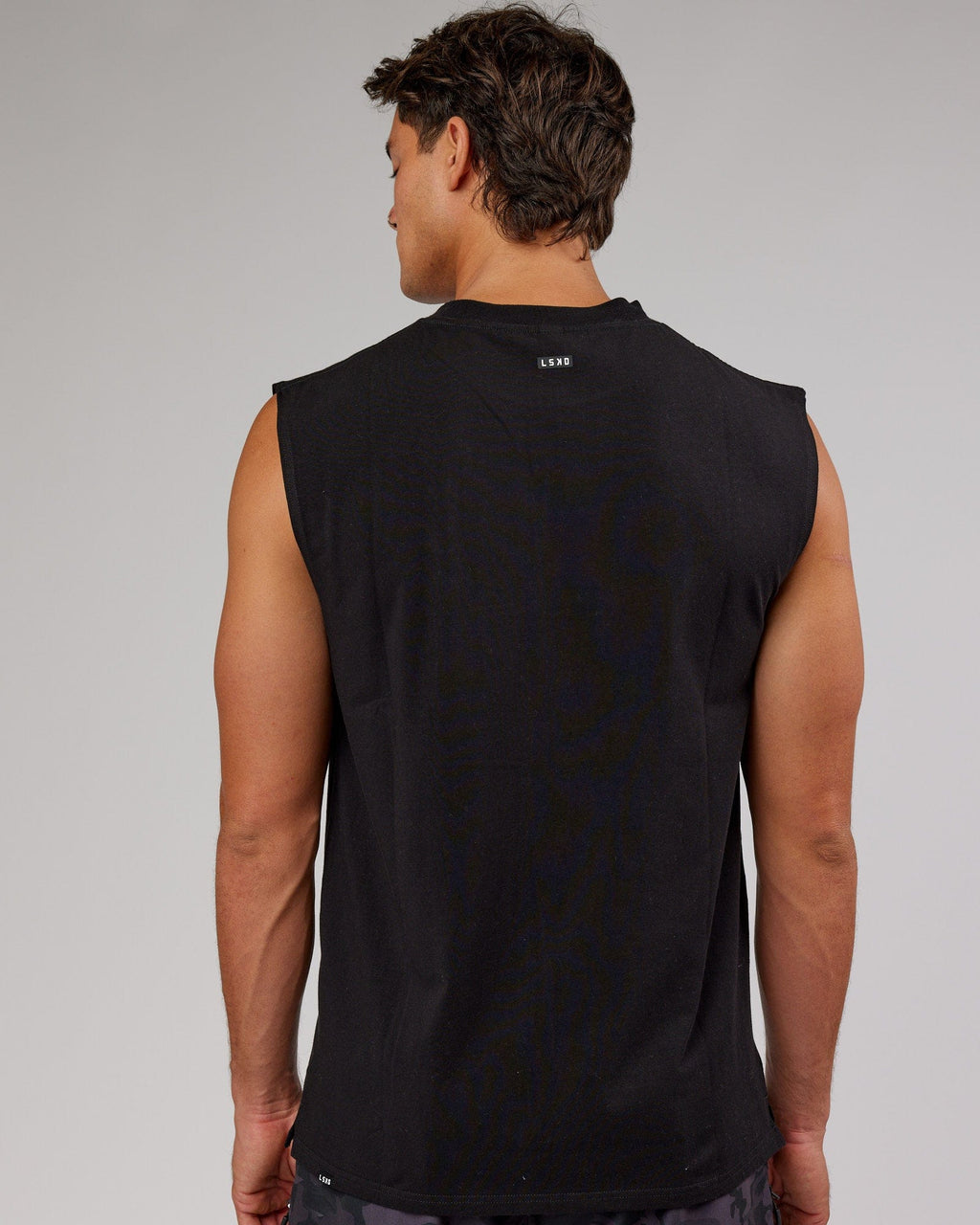 Model wearing Capsule FLXCotton Tank Oversize - Black