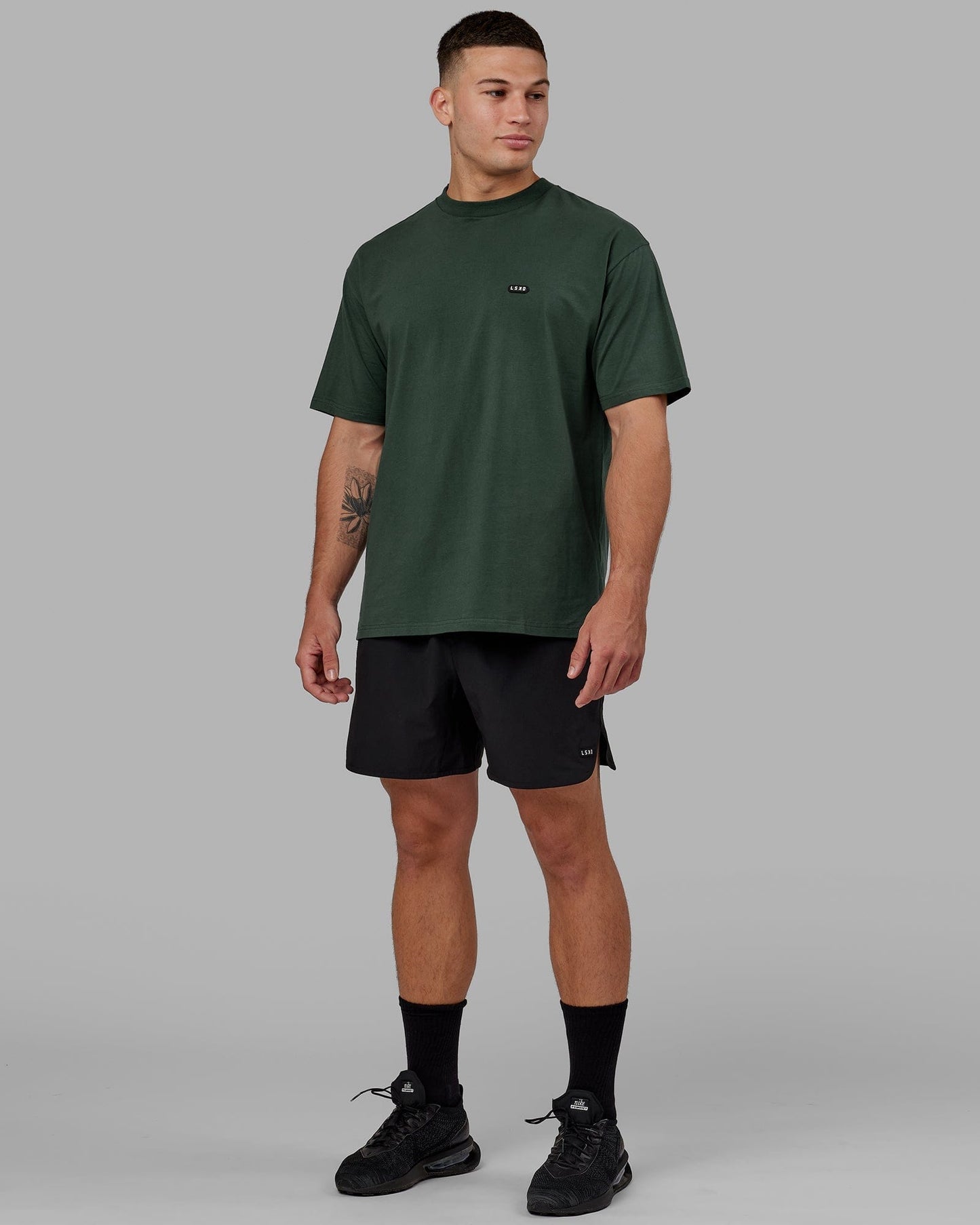 Model wearing Capsule FLXCotton Tee Oversize - Vital Green