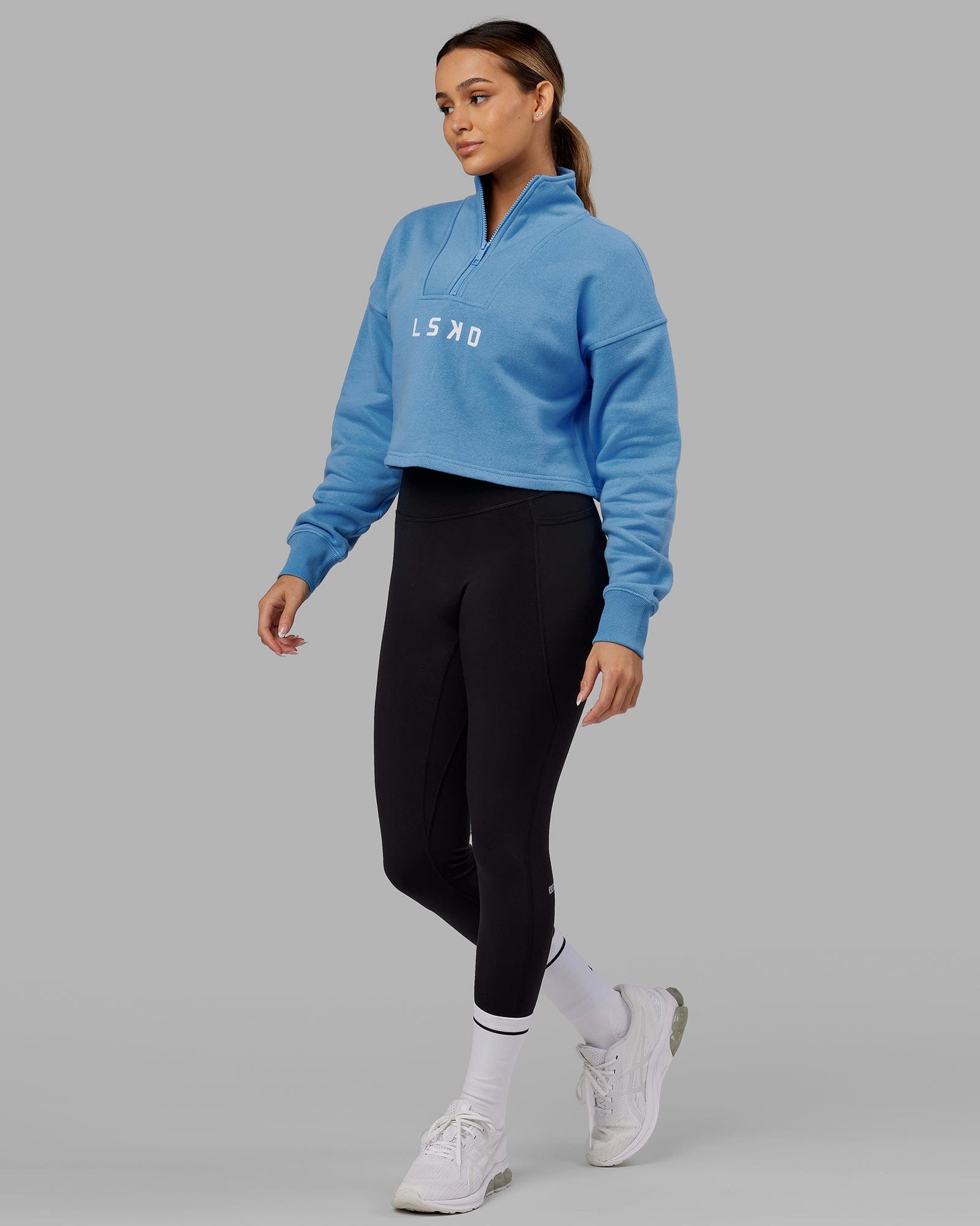 Model wearing Challenger 1/4 Zip Sweater - Azure Blue