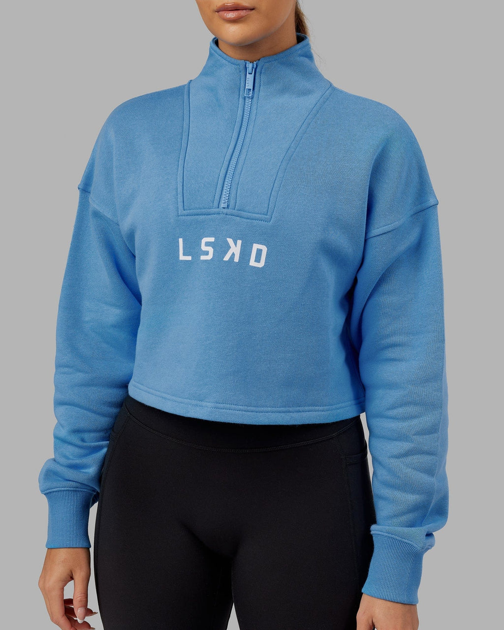 Model wearing Challenger 1/4 Zip Sweater - Azure Blue