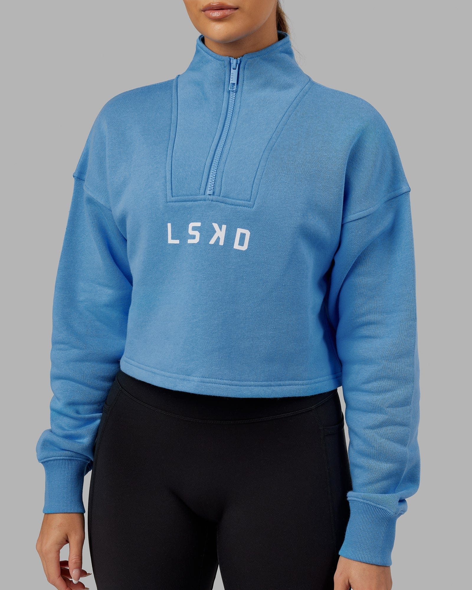 Model wearing Challenger 1/4 Zip Sweater - Azure Blue