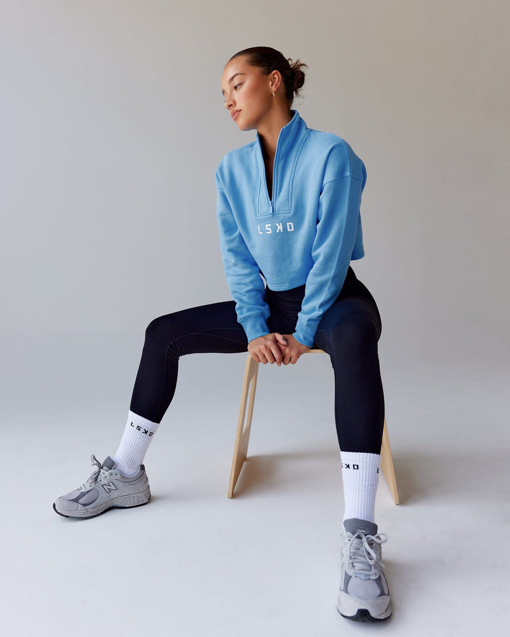 Model wearing Challenger 1/4 Zip Sweater - Azure Blue
