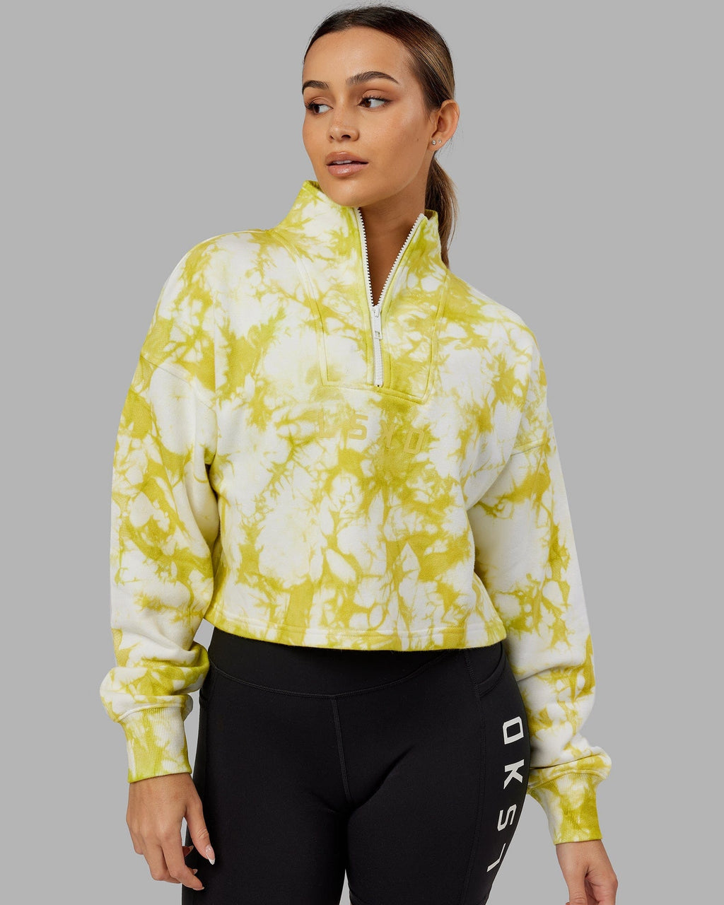 Model wearing Challenger 1/4 Zip Sweater - Citrus Green Tie Dye