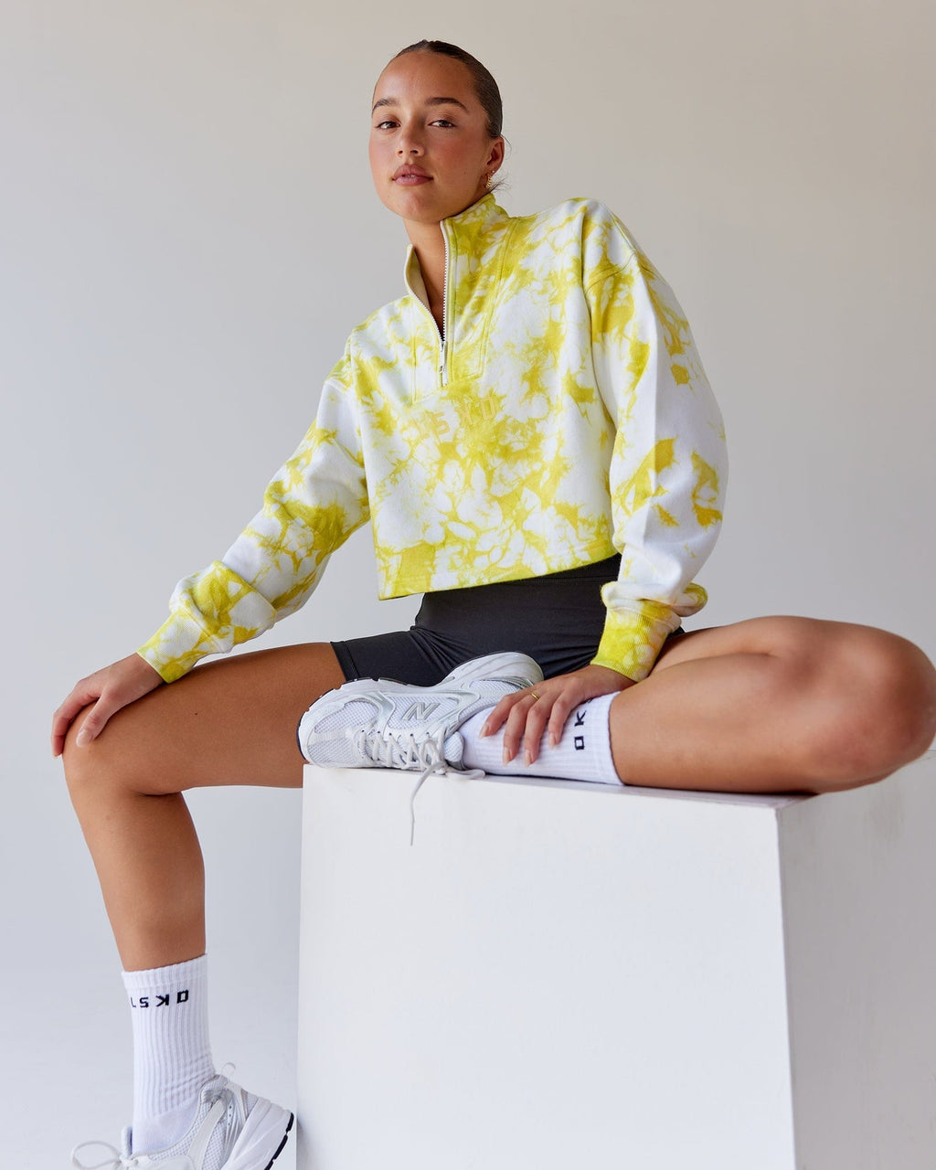 Model wearing Challenger 1/4 Zip Sweater - Citrus Green Tie Dye