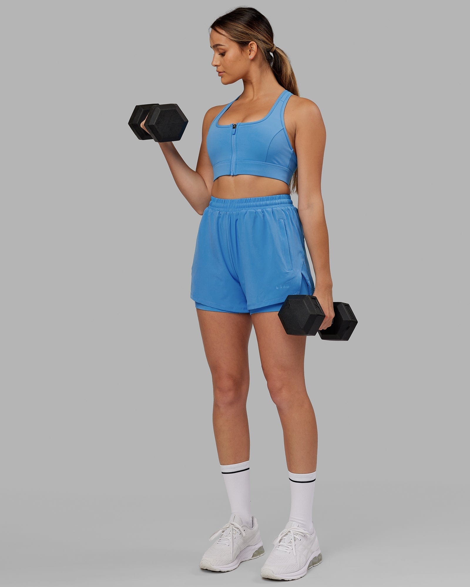 Model wearing Challenger Liner Run Short - Azure Blue