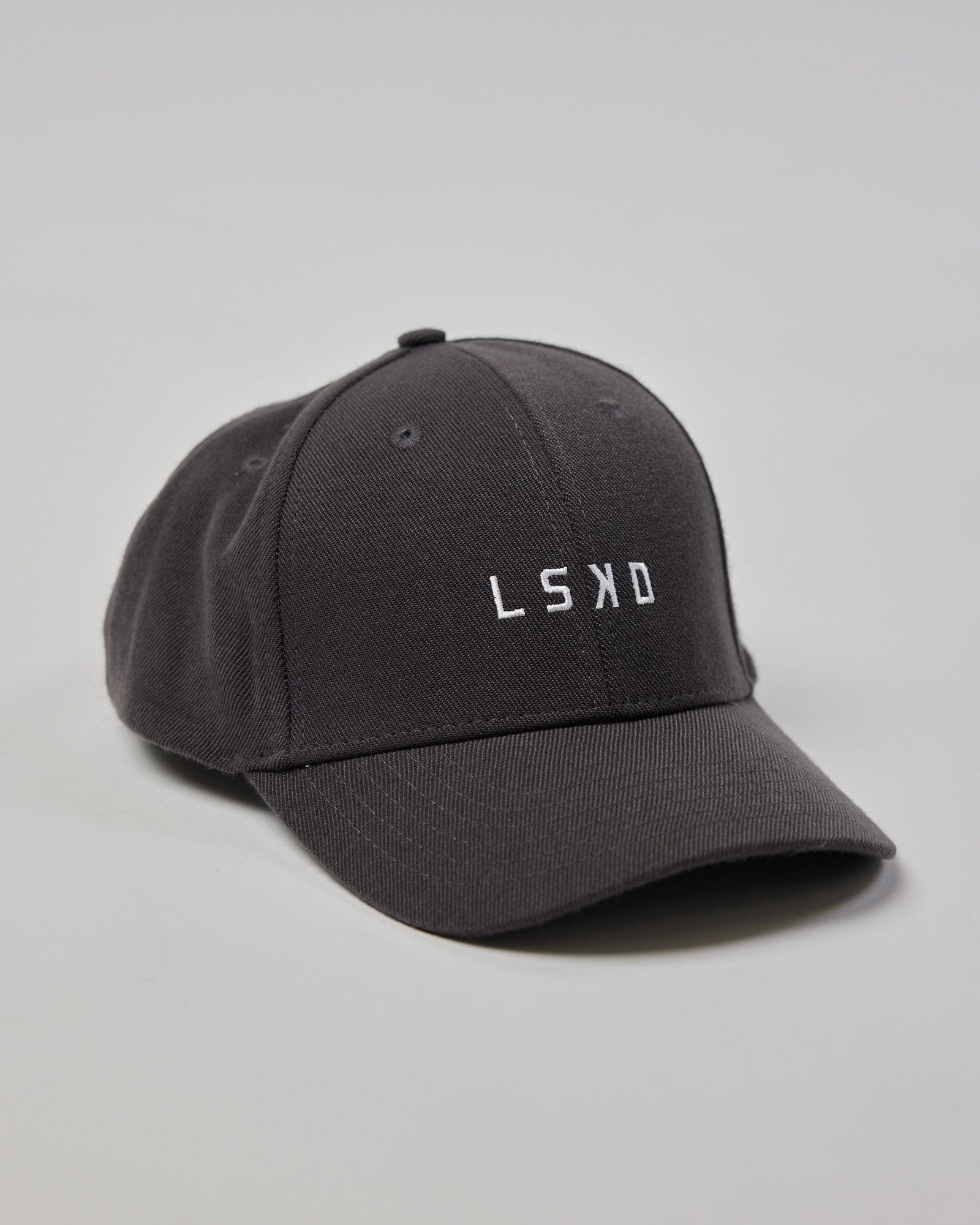 Model wearing Classic Strapback Cap - Asphalt