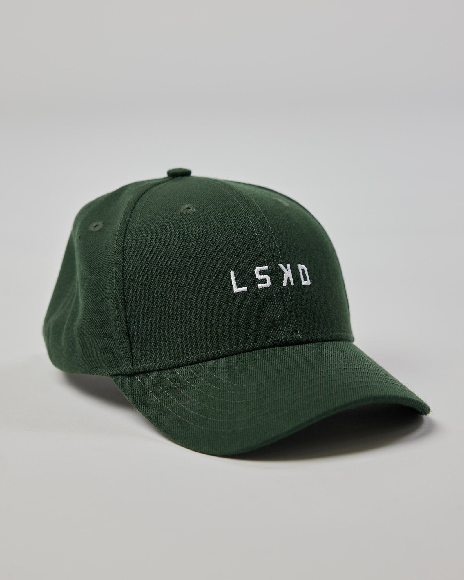 Model wearing Classic Strapback Cap - Pineneedle