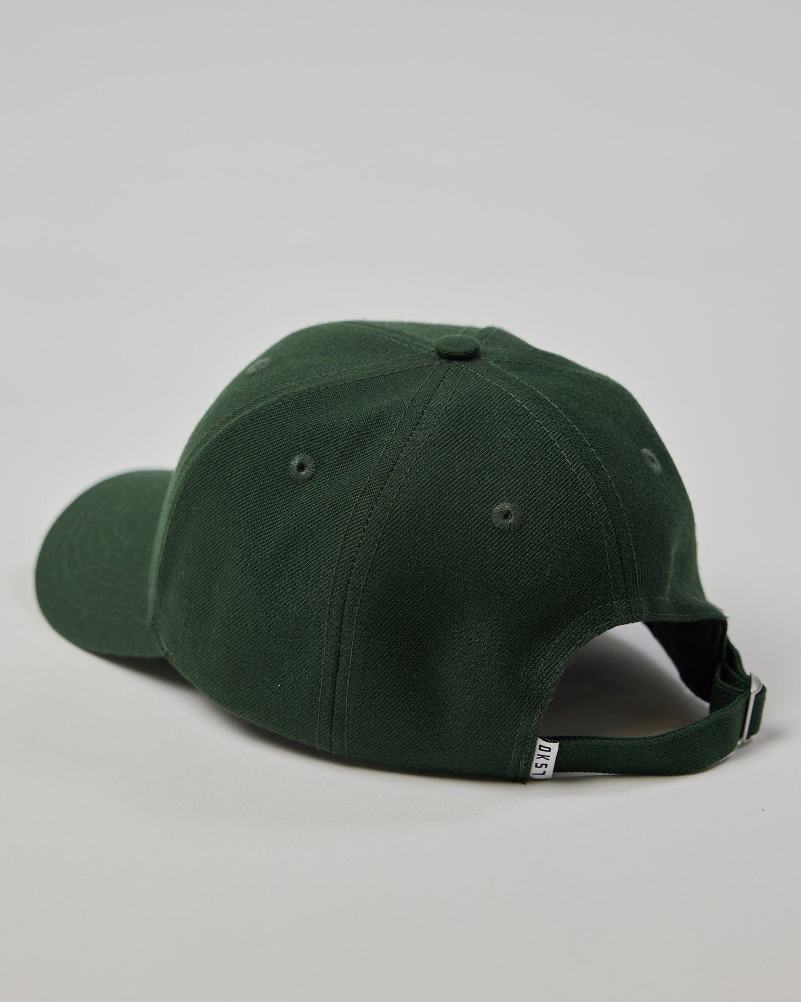 Model wearing Classic Strapback Cap - Pineneedle