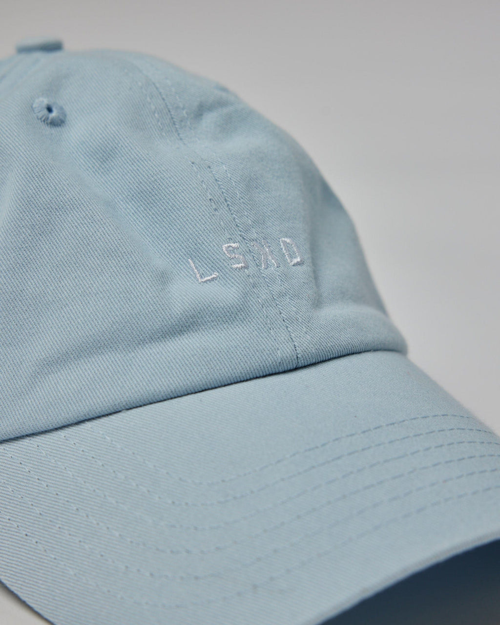 Model wearing Compact Cap - Ballad Blue