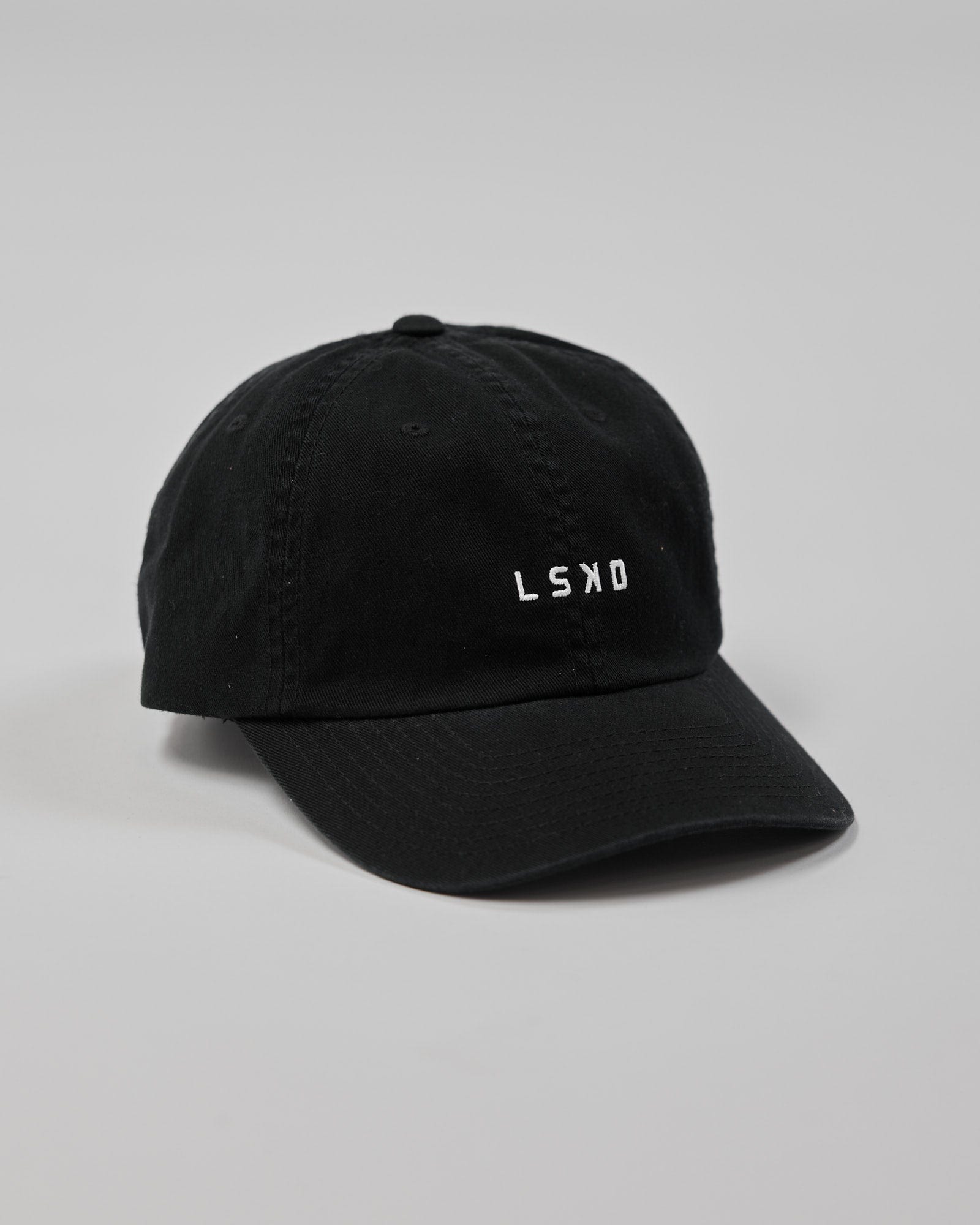 Model wearing Compact Cap - Black