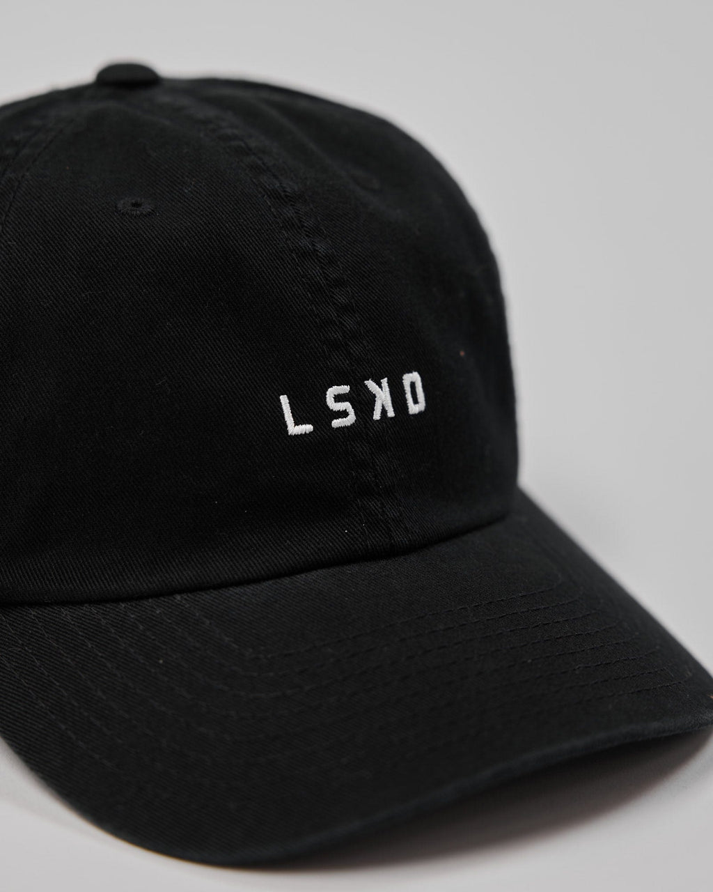 Model wearing Compact Cap - Black