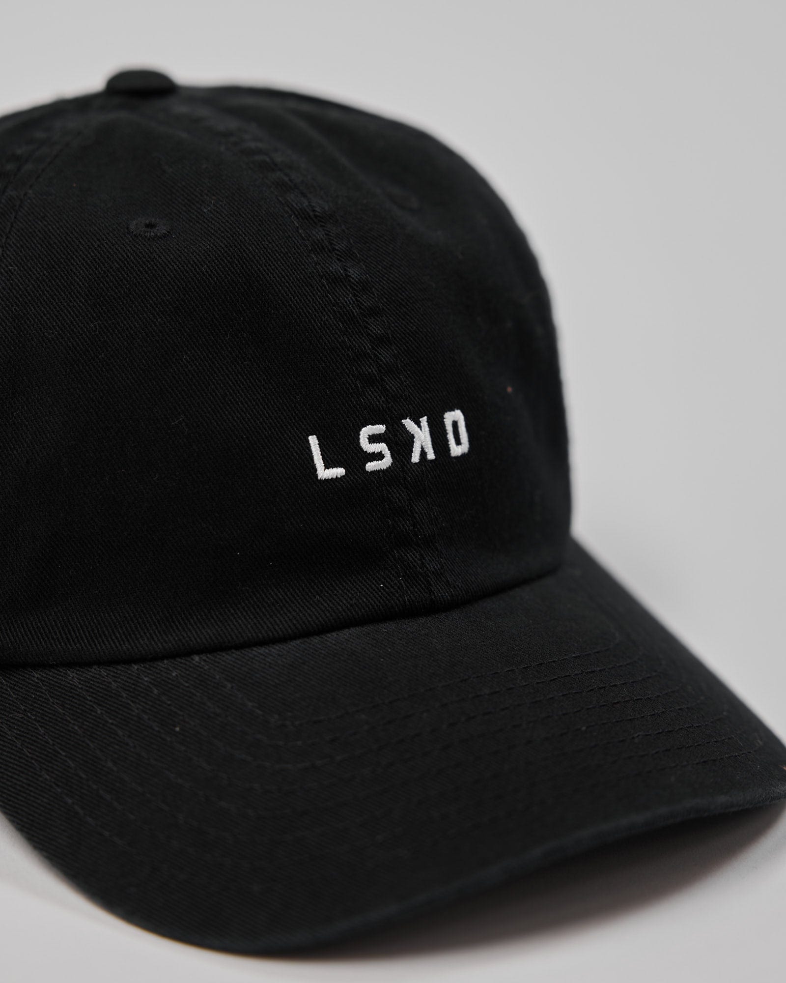 Model wearing Compact Cap - Black